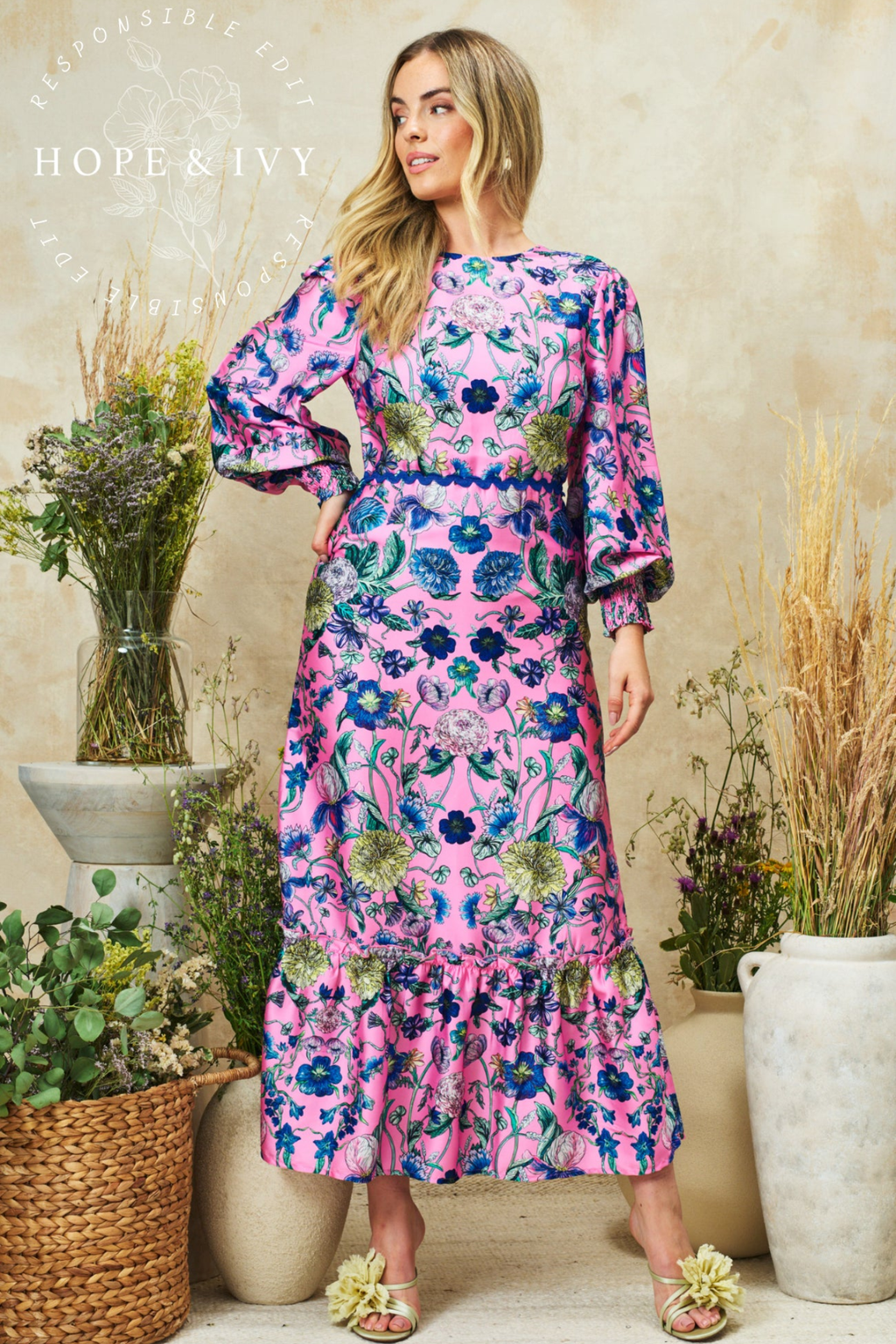 Romantic pink maxi dress by Hope & Ivy with high neck, blouson sleeves and bow back detail. Shop Hope & Ivy Dresses at Dotique.