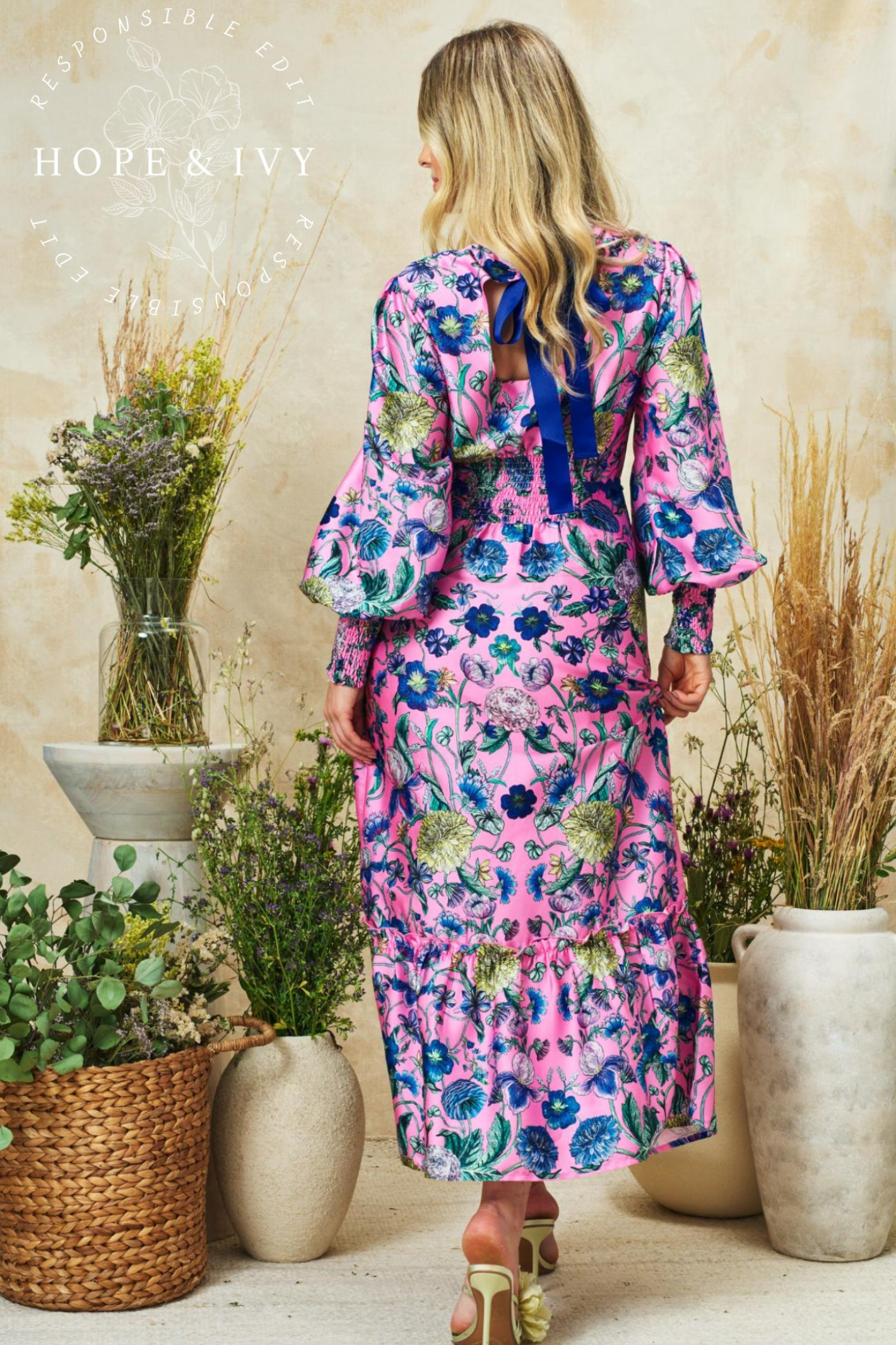 Romantic pink maxi dress by Hope & Ivy with high neck, blouson sleeves and bow back detail. Shop Hope & Ivy Dresses at Dotique.
