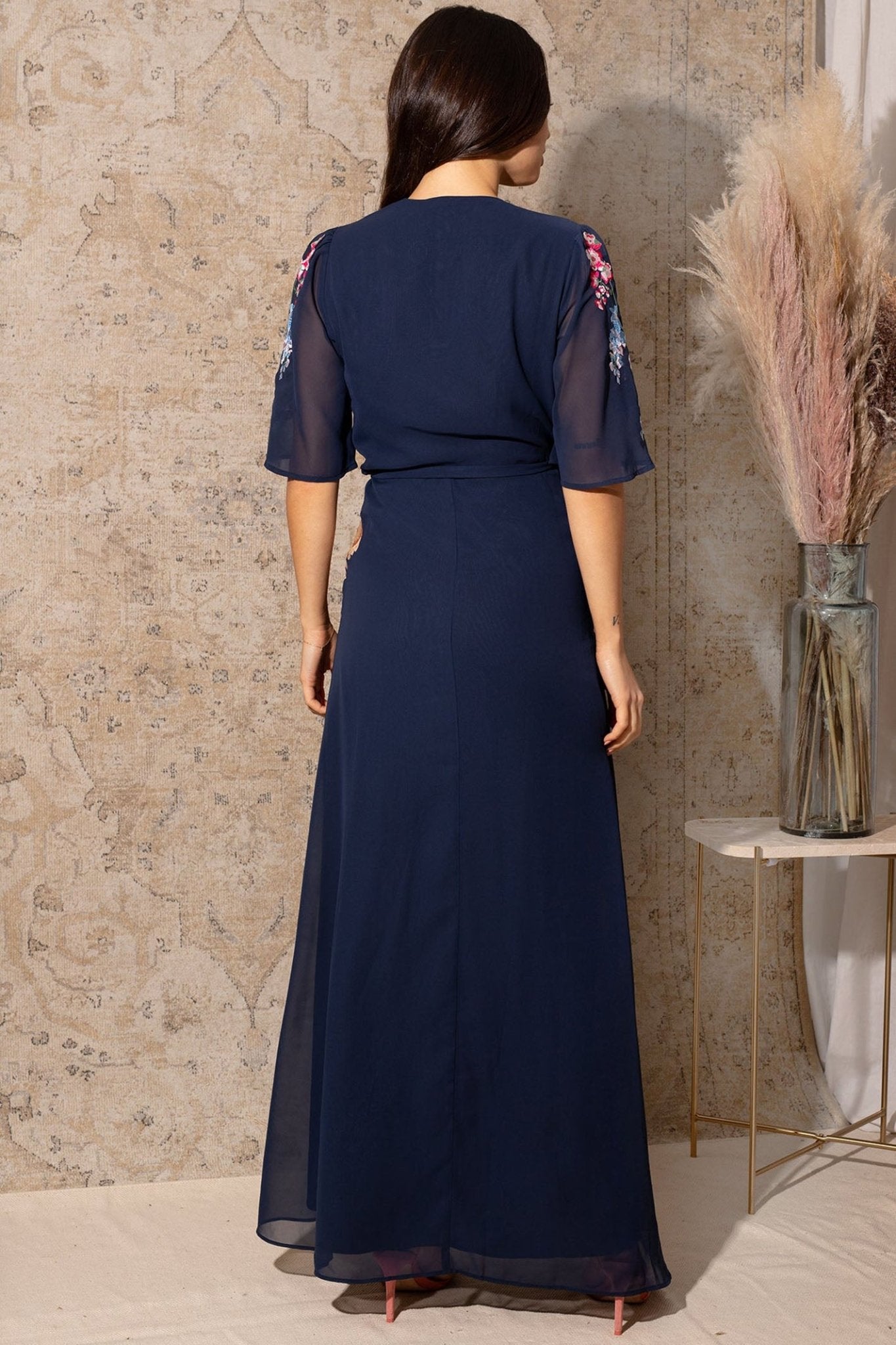 Hope & Ivy The Gisela Embroidered Flutter Sleeve Maxi Wrap Dress with Tie Waist - Dotique