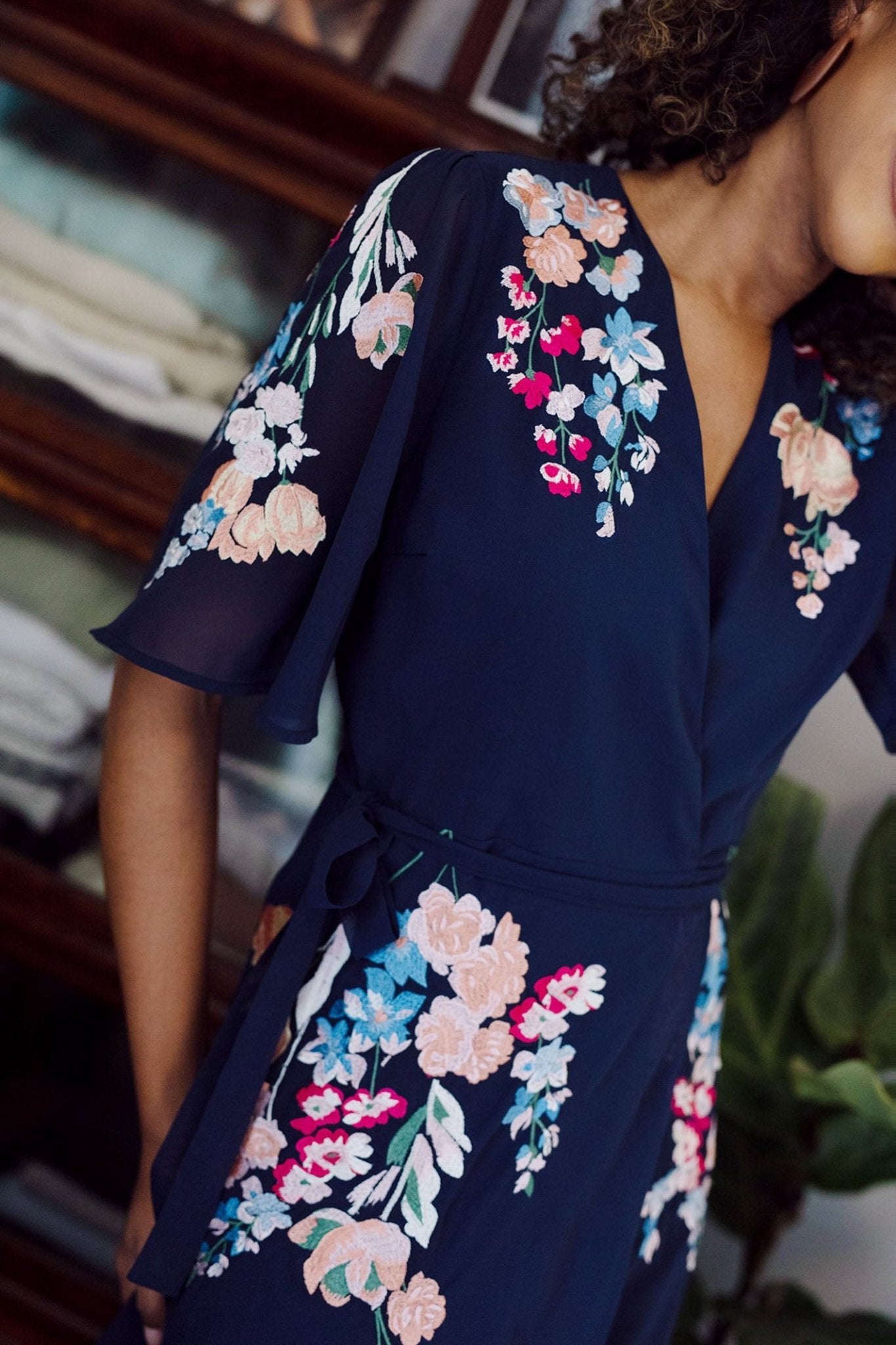 Hope & Ivy The Gisela Embroidered Flutter Sleeve Maxi Wrap Dress with Tie Waist - Dotique