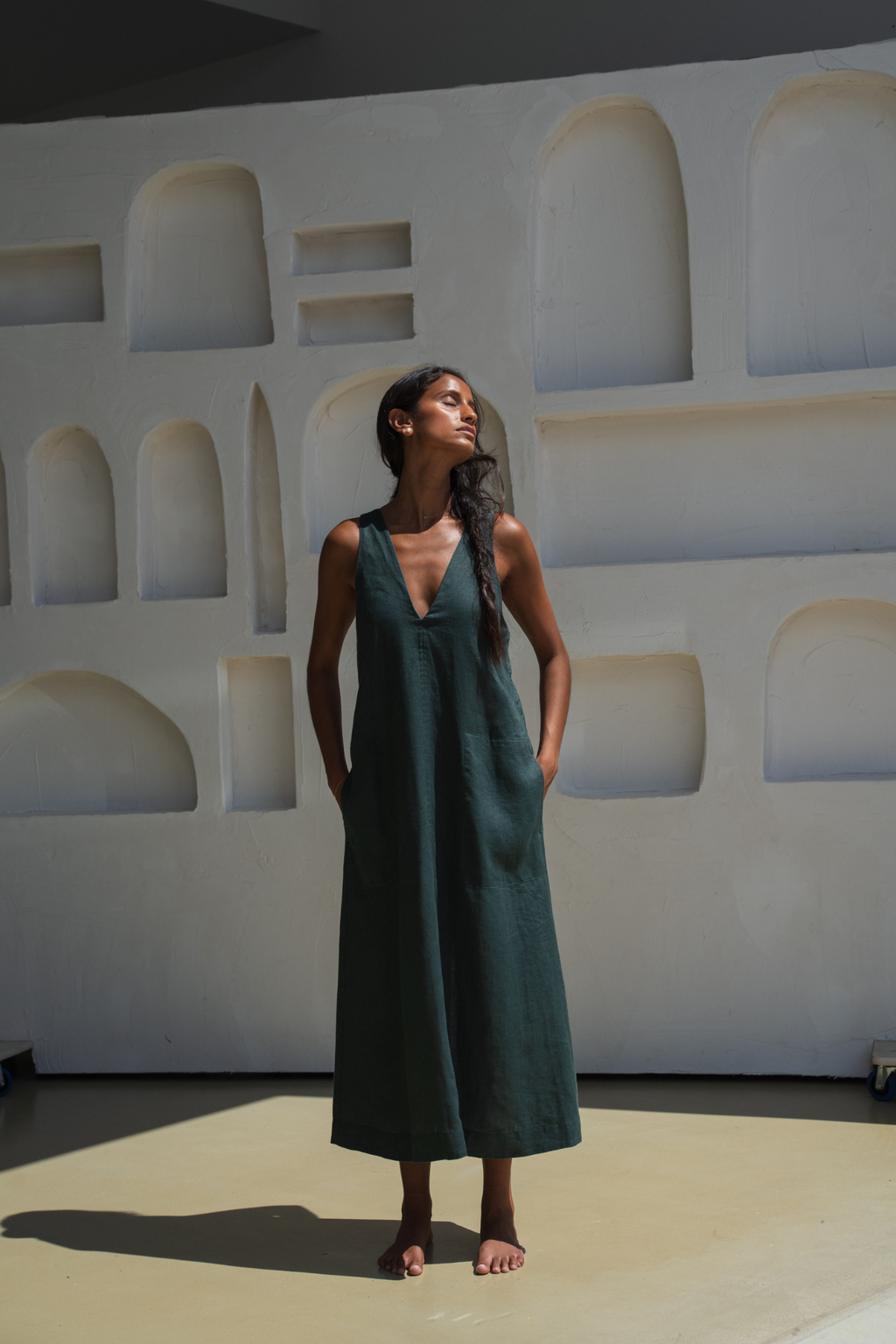 Woman wearing Lilly Pilly LP-D018 Iris Linen Dress Forest by Lilly Pilly, shop Lilly Pilly at Dotique.