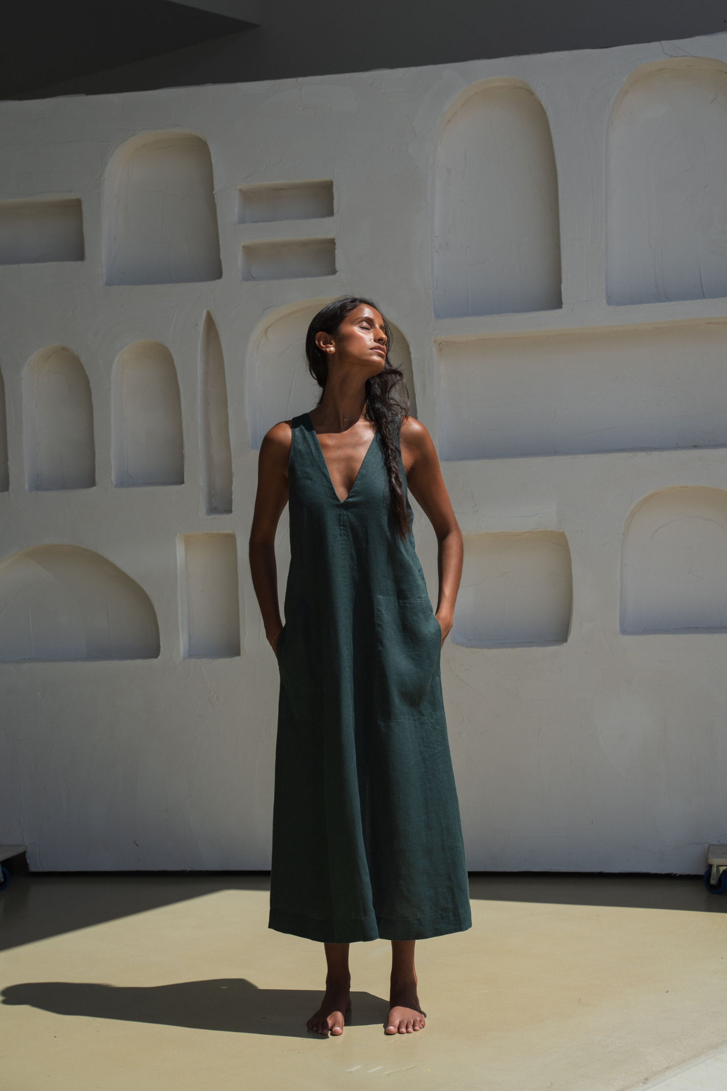 Woman wearing Lilly Pilly LP-D018 Iris Linen Dress Forest by Lilly Pilly, shop Lilly Pilly at Dotique.