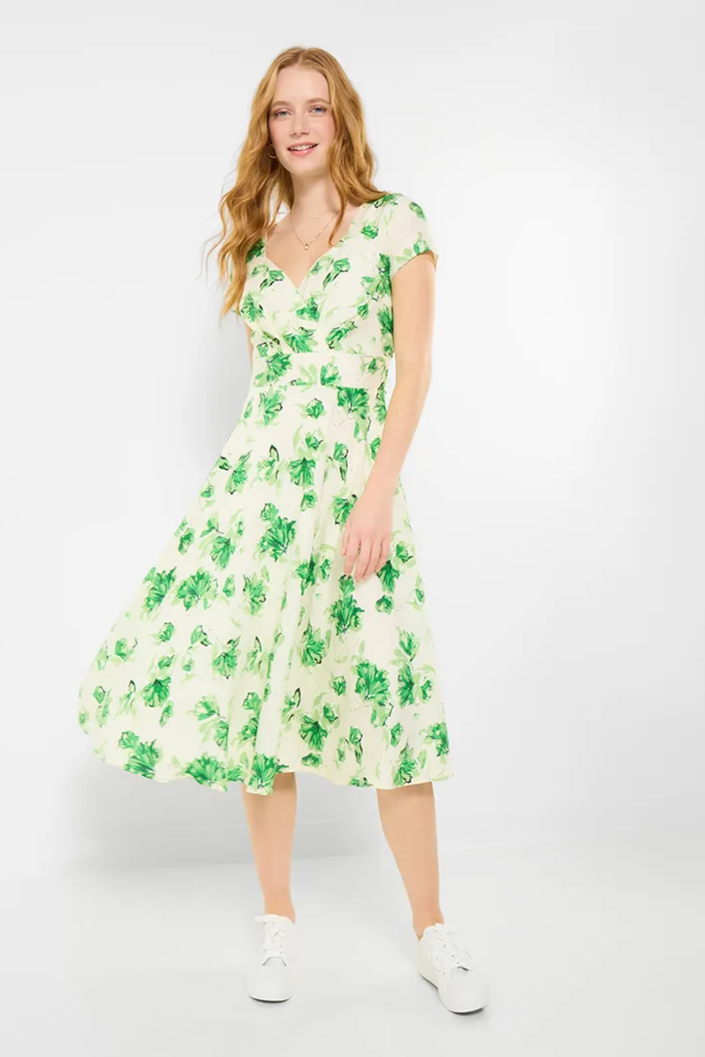 Woman wearing Joe Browns WF416A Day At The Races Floral Dress Green by Joe Browns, shop Joe Browns at Dotique for fresh vibrant style