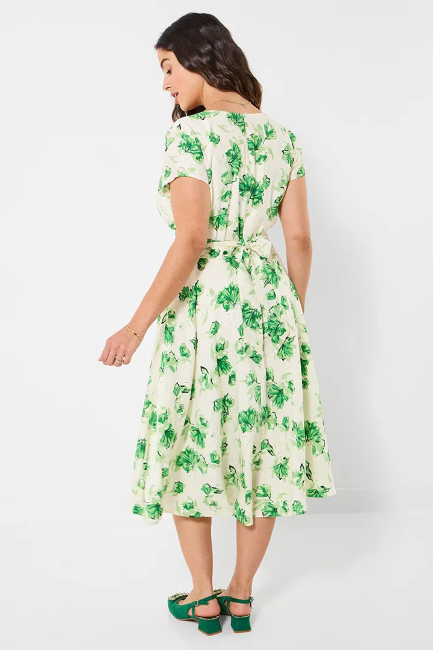 Woman wearing Joe Browns WF416A Day At The Races Floral Dress Green by Joe Browns, shop Joe Browns at Dotique for fresh spring style
