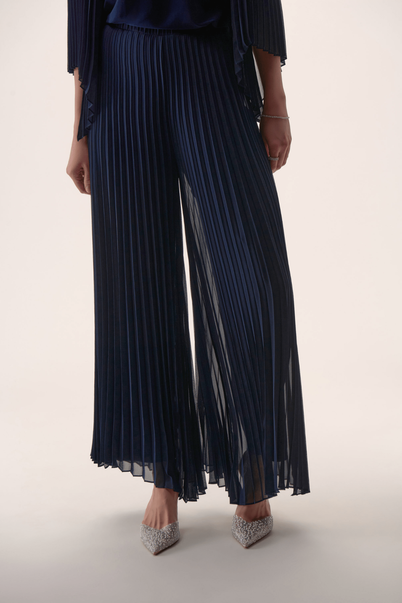 Joseph Ribkoff midnight blue pleated chiffon wide-leg trousers with pull-on waistband and full lining
