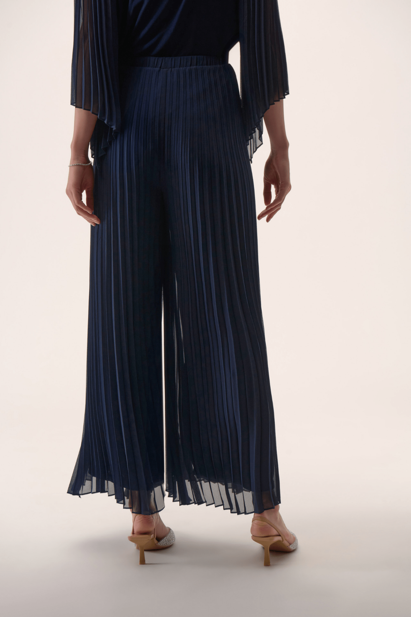 Joseph Ribkoff midnight blue pleated chiffon wide-leg trousers with pull-on waistband and full lining
