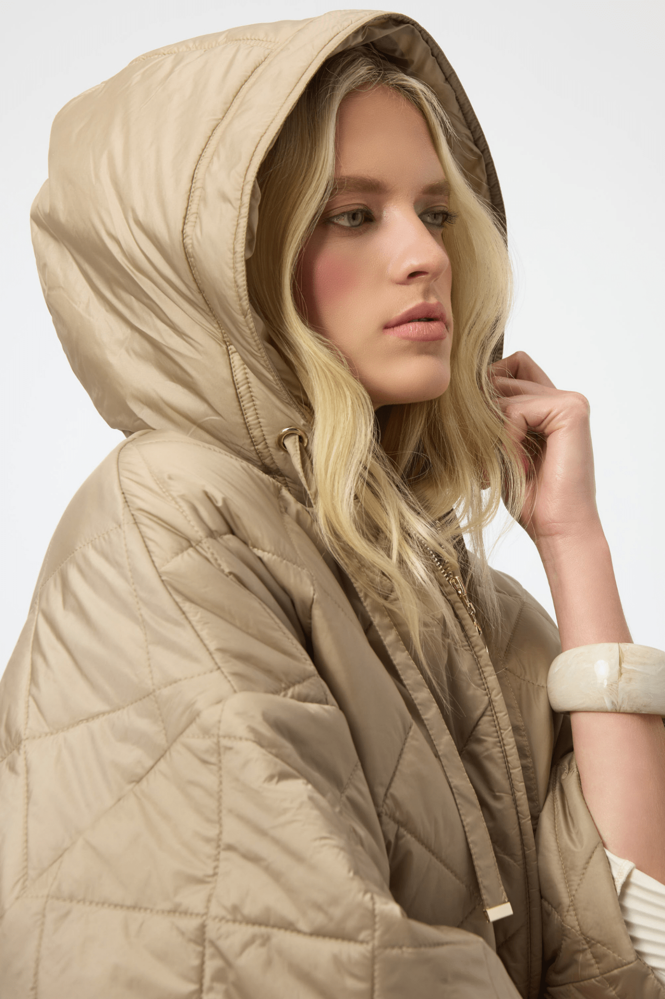 Joseph Ribkoff gold quilted hooded jacket with diamond pattern and kimono sleeves