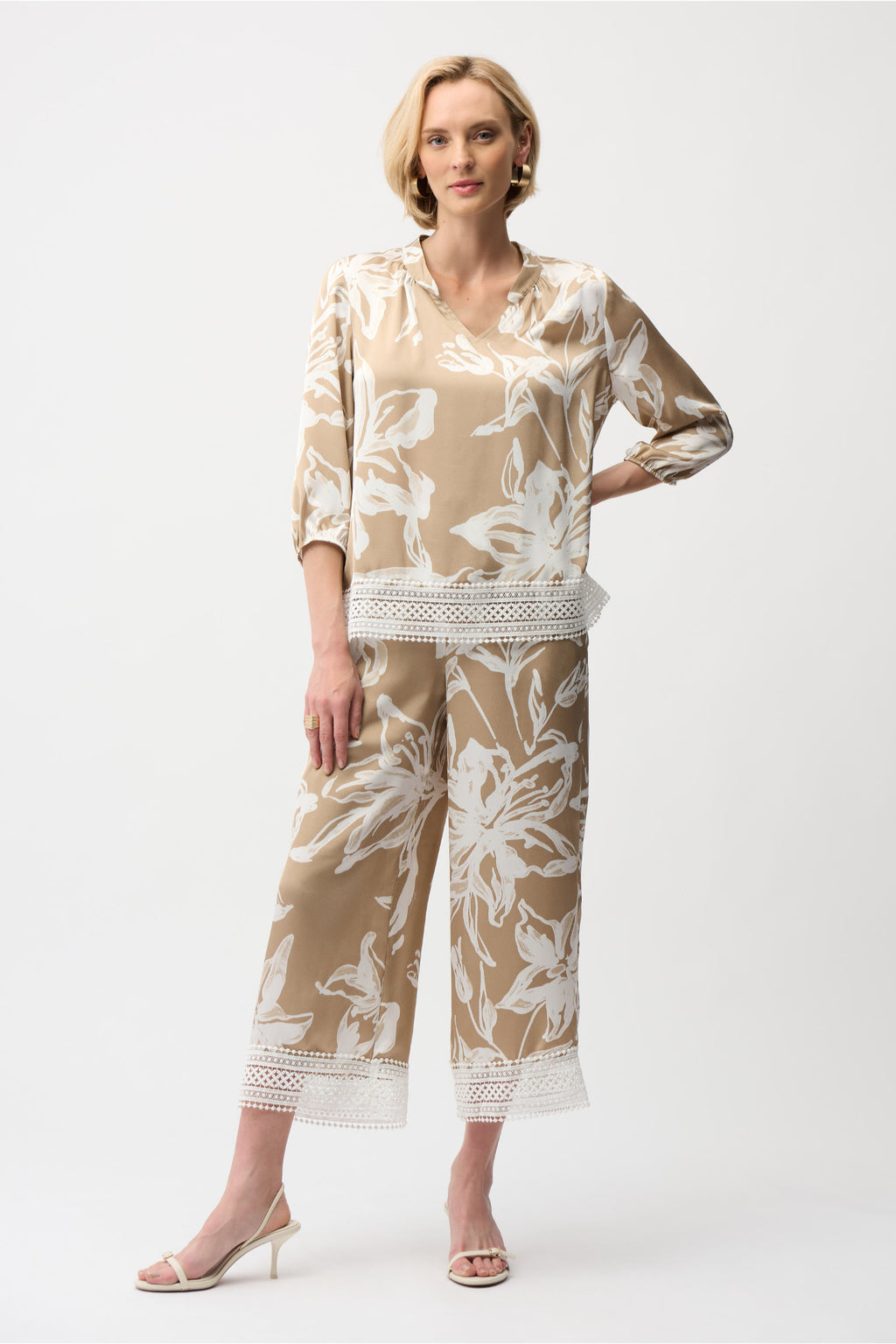 Model wearing Joseph Ribkoff 261031 Satin Floral Print Straight Top With Mandarin Collar featuring beige and white floral satin fabric by Joseph Ribkoff, shop Joseph Ribkoff at Dotique.