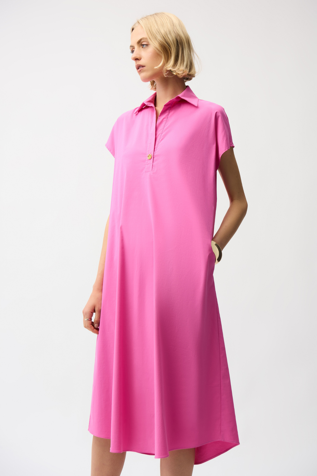 Joseph Ribkoff 261049 pink trapeze shirt dress in stretch poplin. Easy fit with collar, pockets and short sleeves. Shop at Dotique.