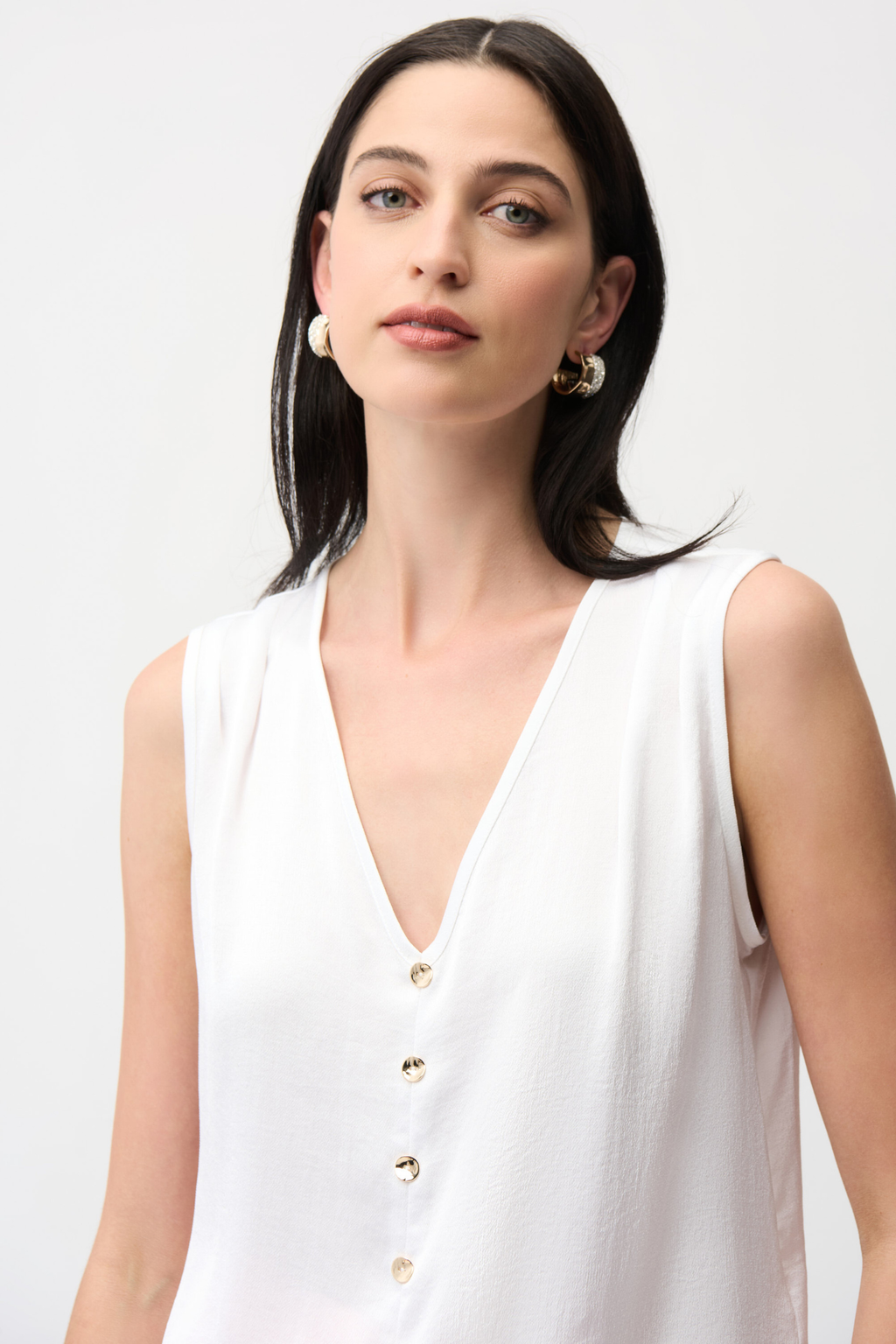 Joseph Ribkoff 261249 recycled satin boxy top with V-neck and gold button detail. Lightweight, polished and easy to wear. Shop Dotique.