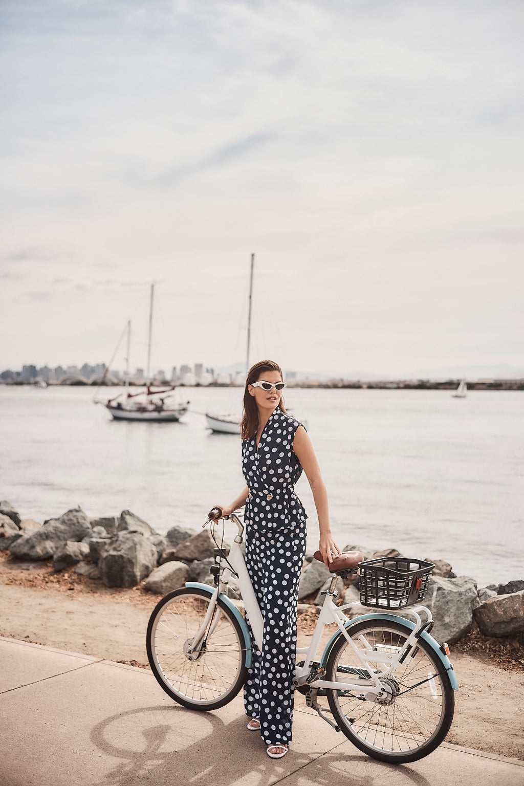 Model wearing Joseph Ribkoff 261305 Georgette Polka Dot Wide Leg Trousers Midnight Blue by Joseph Ribkoff, shop Joseph Ribkoff at Dotique