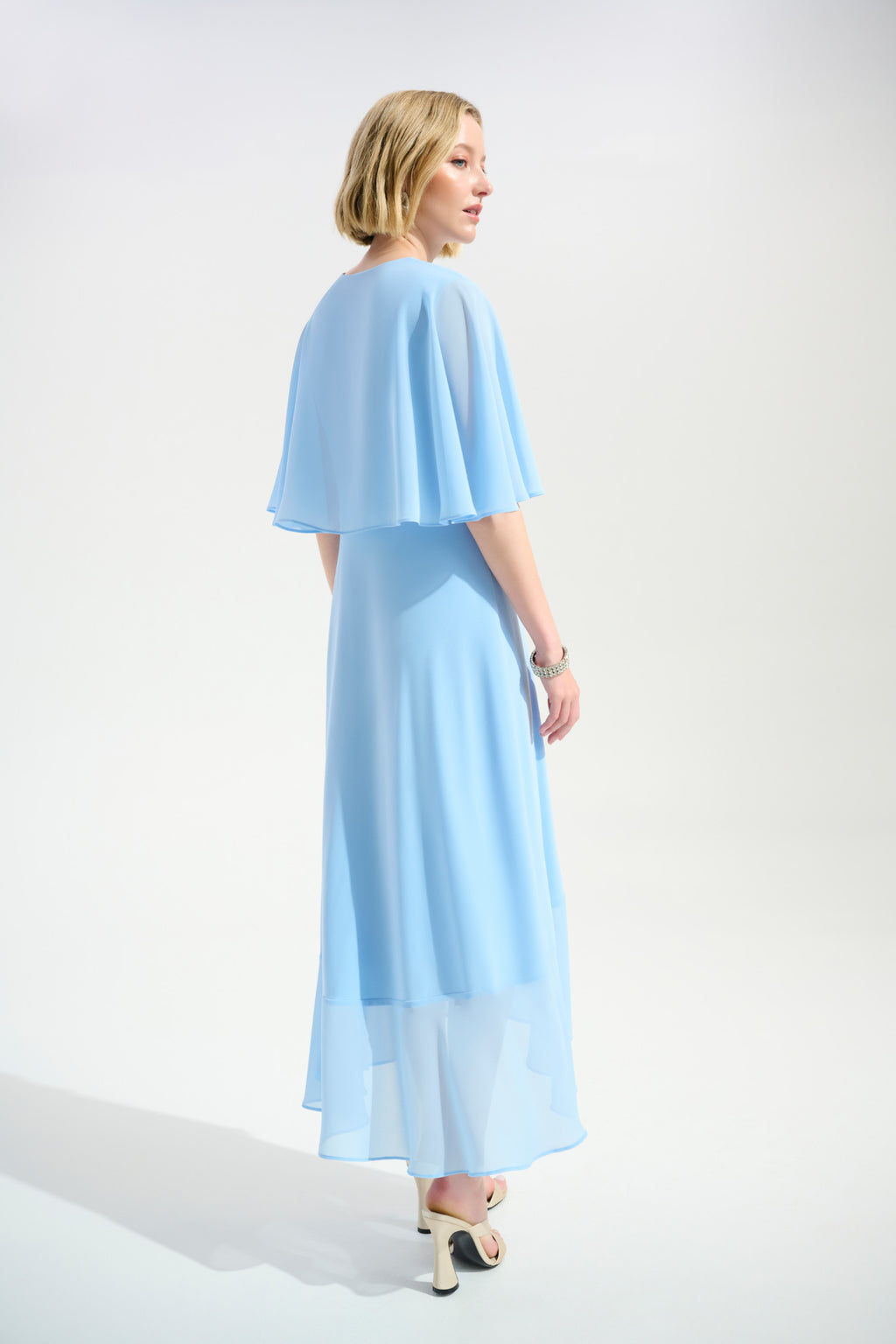 Joseph Ribkoff 261714 Sky Blue Signature Silky Knit Flowy Wrap Dress With Buckle Rhinestones Detail by joseph ribkoff shop the brand at Dotique back view