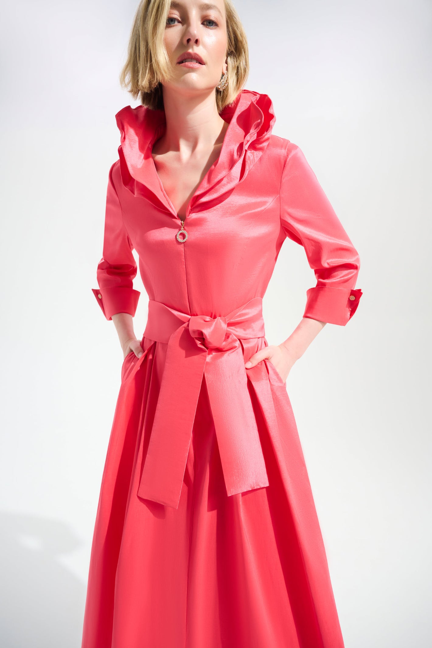 Woman wearing Joseph Ribkoff 261719 Coral Signature Stretch Taffeta Fit & Flare Dress by Joseph Ribkoff, shop Dotique.