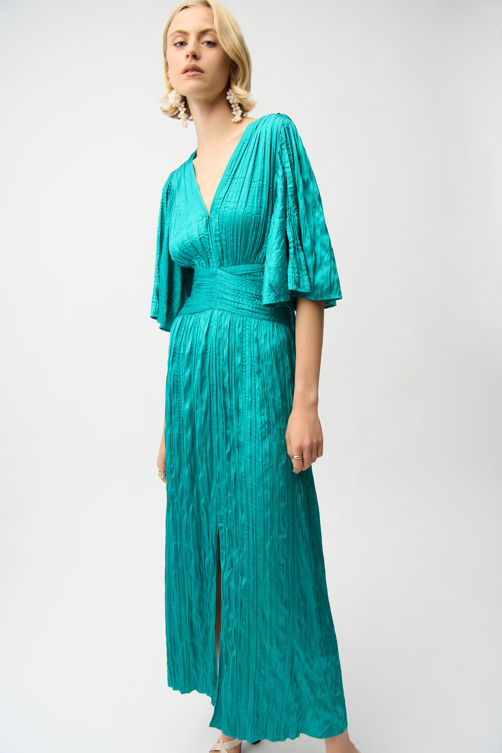 Joseph Ribkoff 261962 satin fit and flare midi dress with pleated knot waist and flare sleeves. Elegant, flattering and perfect for occasions. Shop Dotique.