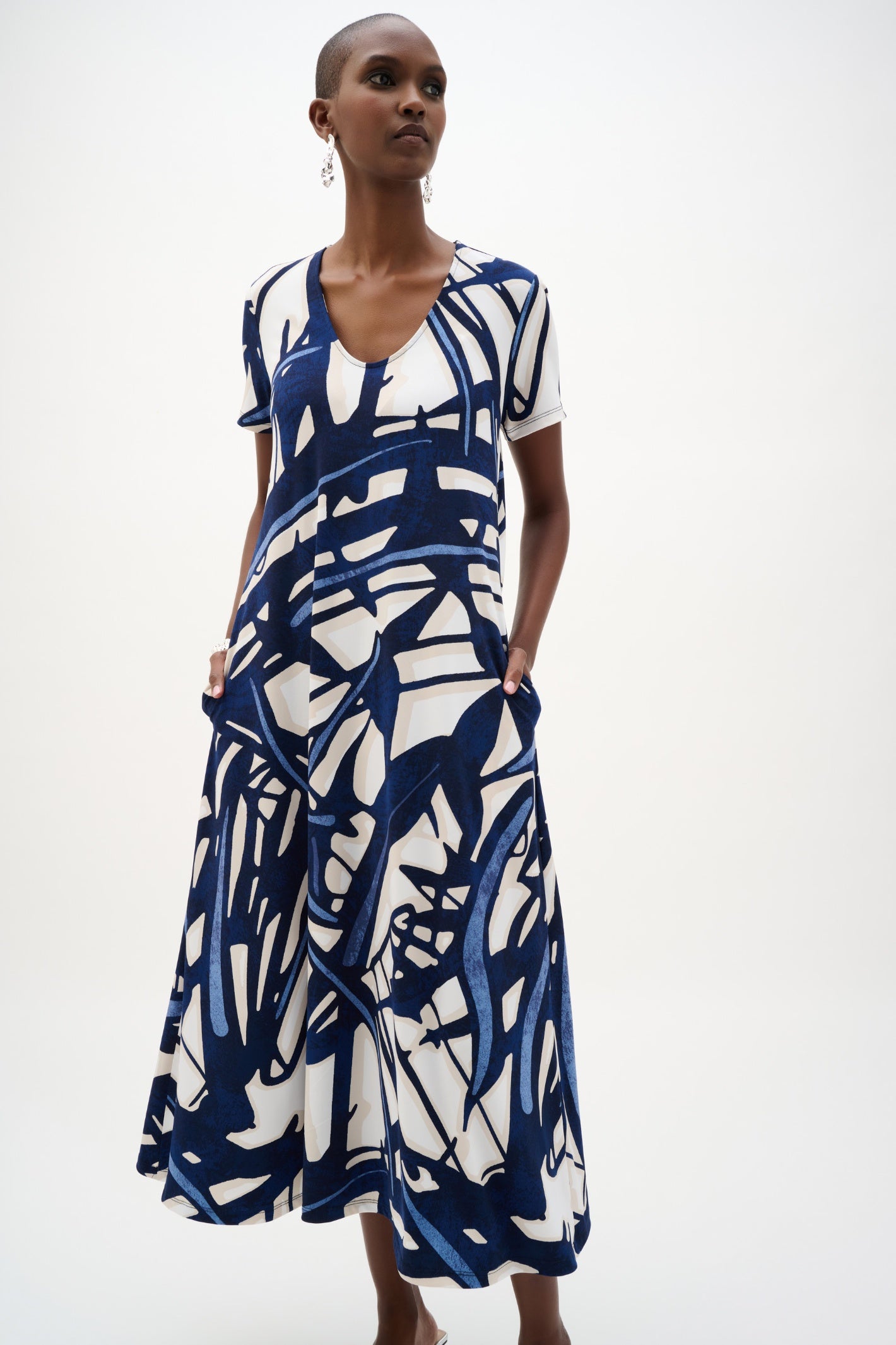 Model wearing Joseph Ribkoff 262245 Silky Knit Abstract Print Trapeze Dress Vanilla/Multi by Joseph Ribkoff shop Dotique