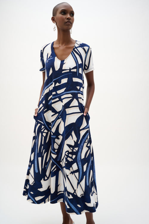 Model wearing Joseph Ribkoff 262245 Silky Knit Abstract Print Trapeze Dress Vanilla/Multi by Joseph Ribkoff shop Dotique