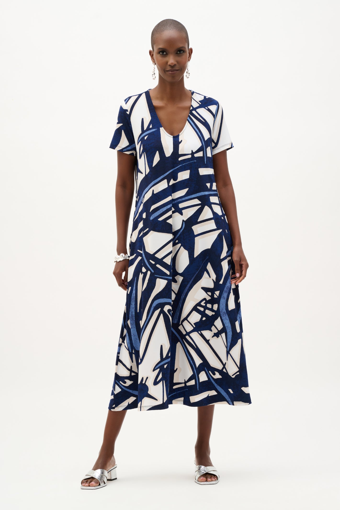Model showcasing Joseph Ribkoff 262245 Silky Knit Abstract Print Trapeze Dress Vanilla/Multi by Joseph Ribkoff shop Dotique