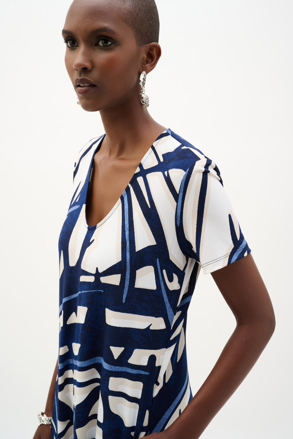 Model wearing Joseph Ribkoff 262245 Silky Knit Abstract Print Trapeze Dress Vanilla/Multi by Joseph Ribkoff shop Dotique