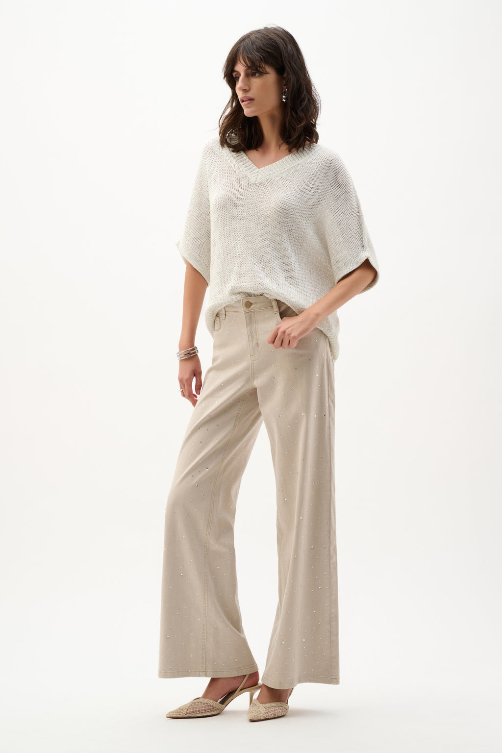 Model wearing Joseph Ribkoff 262925 Viscose & Lurex Relaxed Knit Top Vanilla by Joseph Ribkoff, shop Joseph Ribkoff at Dotique