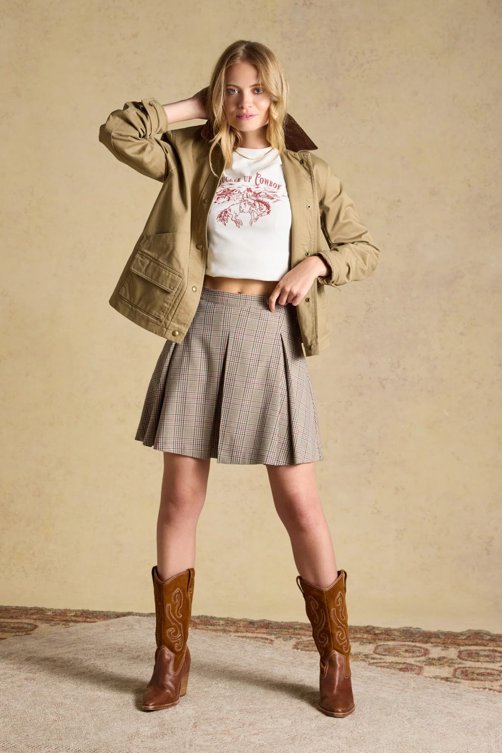 Shop the Joules Ada Short Pleated Skirt in Swindale Tweed. A heritage check mini with structured pleats, tailored waist and concealed side zip.