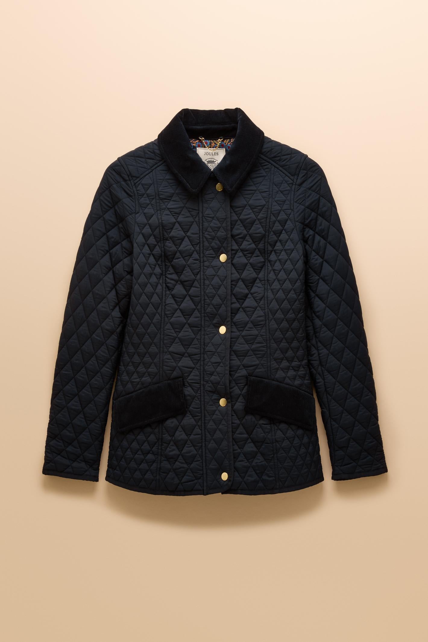 Elegant and practical, the Joules Highclere quilted jacket is designed to handle light showers while maintaining a smart, flattering silhouette. Shop Joules at Dotique.