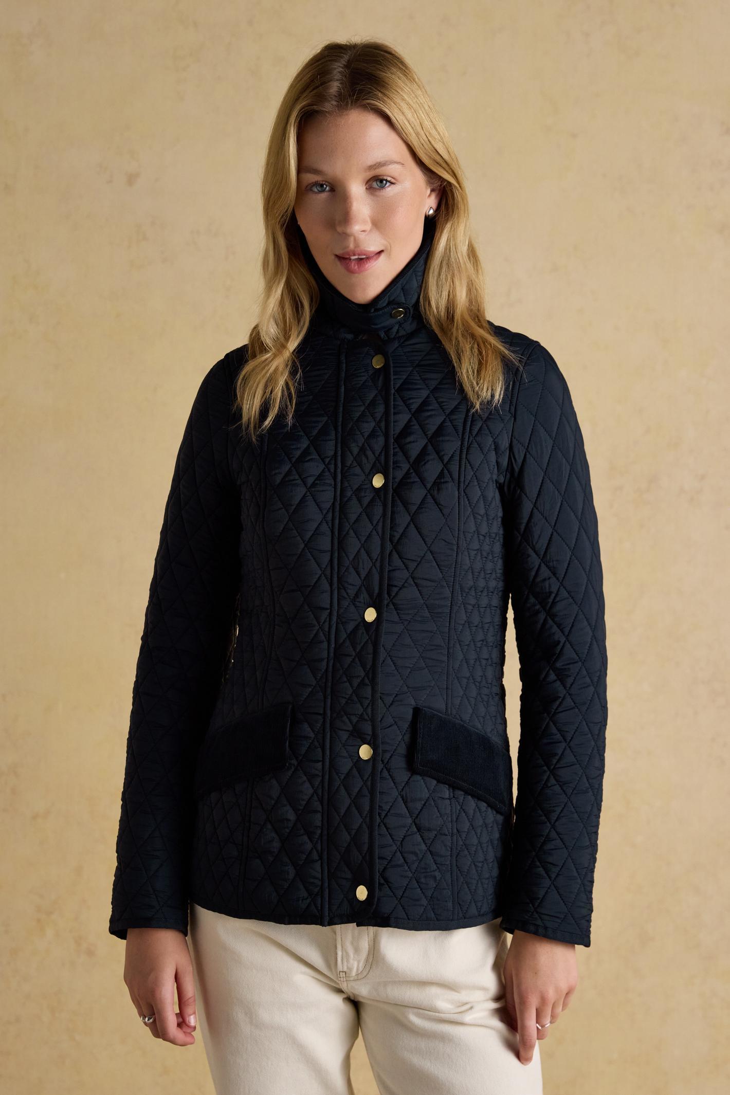Elegant and practical, the Joules Highclere quilted jacket is designed to handle light showers while maintaining a smart, flattering silhouette. Shop Joules at Dotique.