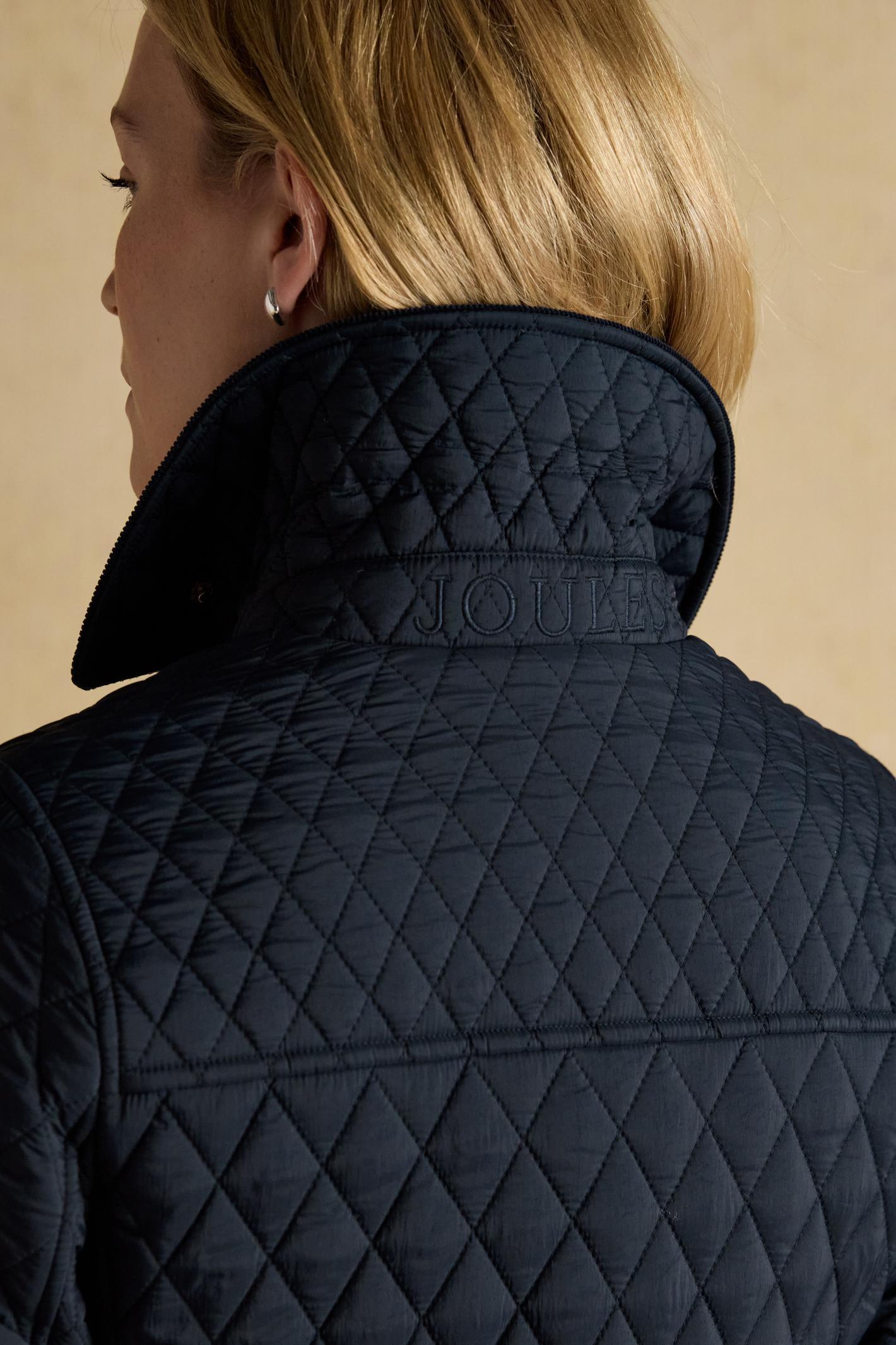 Elegant and practical, the Joules Highclere quilted jacket is designed to handle light showers while maintaining a smart, flattering silhouette. Shop Joules at Dotique.