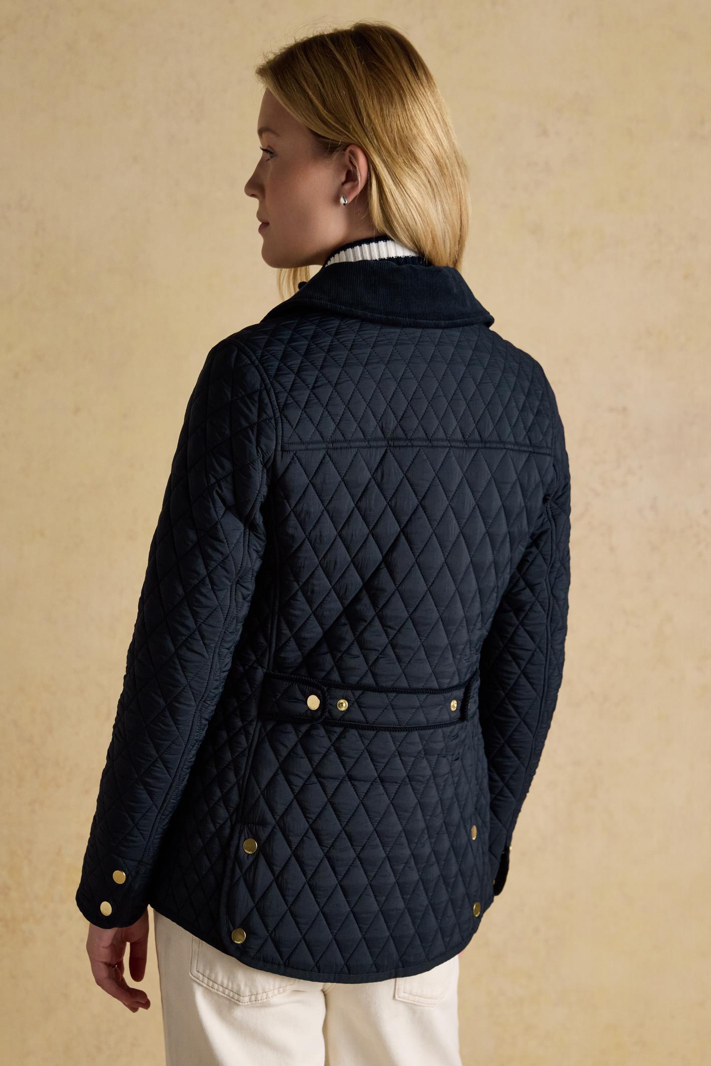 Elegant and practical, the Joules Highclere quilted jacket is designed to handle light showers while maintaining a smart, flattering silhouette. Shop Joules at Dotique.