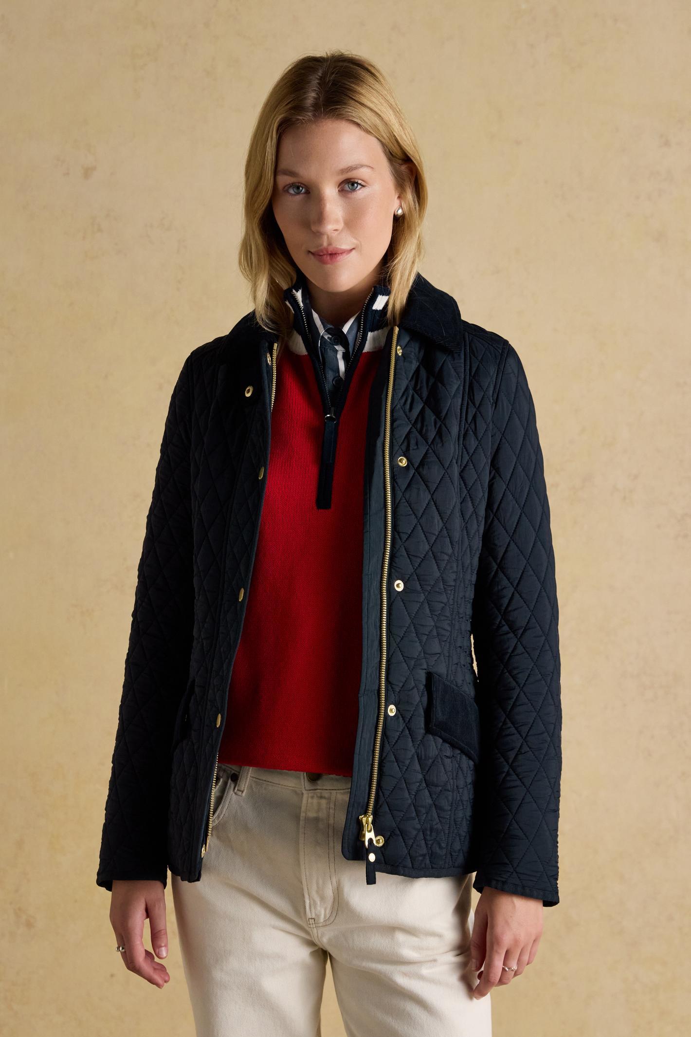 Elegant and practical, the Joules Highclere quilted jacket is designed to handle light showers while maintaining a smart, flattering silhouette. Shop Joules at Dotique.