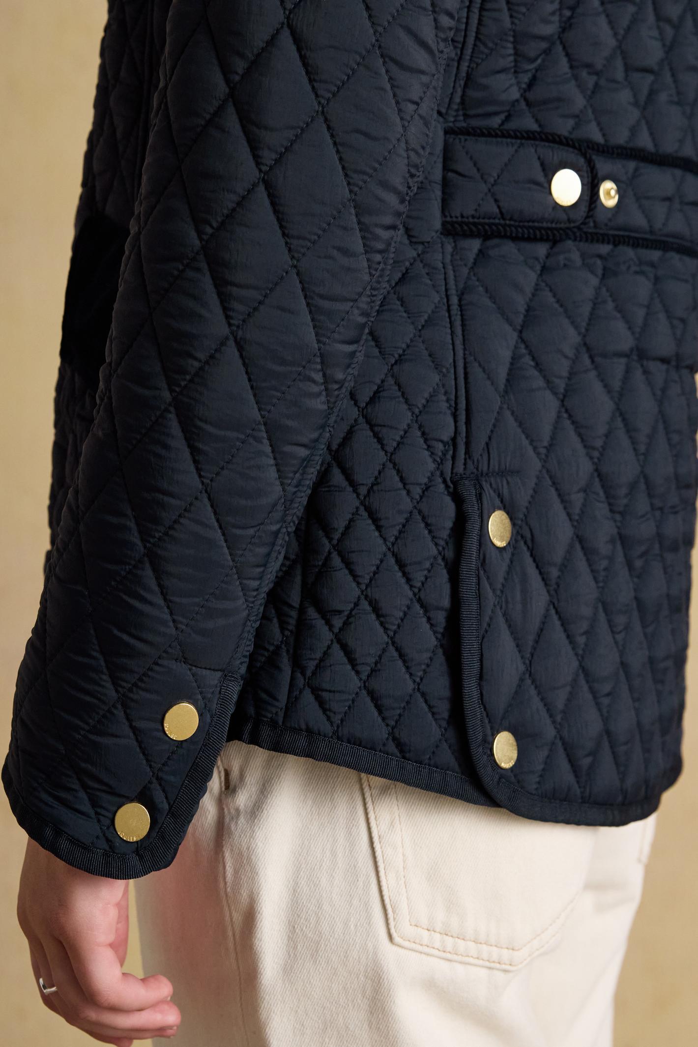 Elegant and practical, the Joules Highclere quilted jacket is designed to handle light showers while maintaining a smart, flattering silhouette. Shop Joules at Dotique.