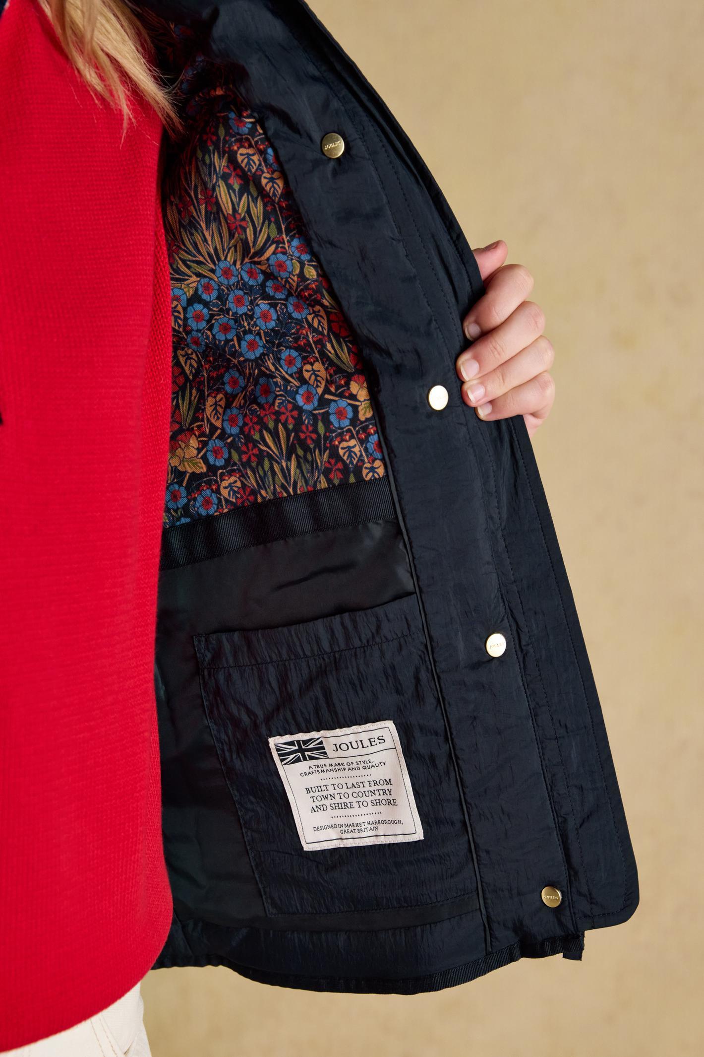 Elegant and practical, the Joules Highclere quilted jacket is designed to handle light showers while maintaining a smart, flattering silhouette. Shop Joules at Dotique.