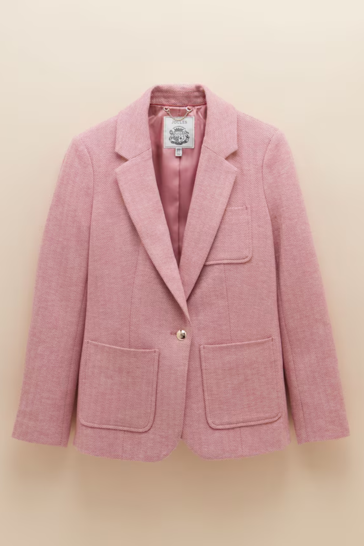 This Joules Albury Pink Herringbone Jersey Tweed Blazer pink cotton rich blazer is one of those pieces that instantly pulls an outfit together. Shop Joules at Dotique.