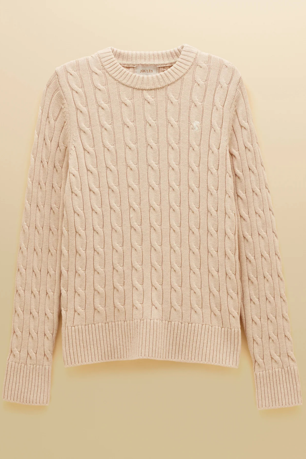 Shop the Joules Classic Cable Jumper in Oatmeal at Dotique. Made from 100% cotton with a crew neck, ribbed trims and signature hare embroidery.