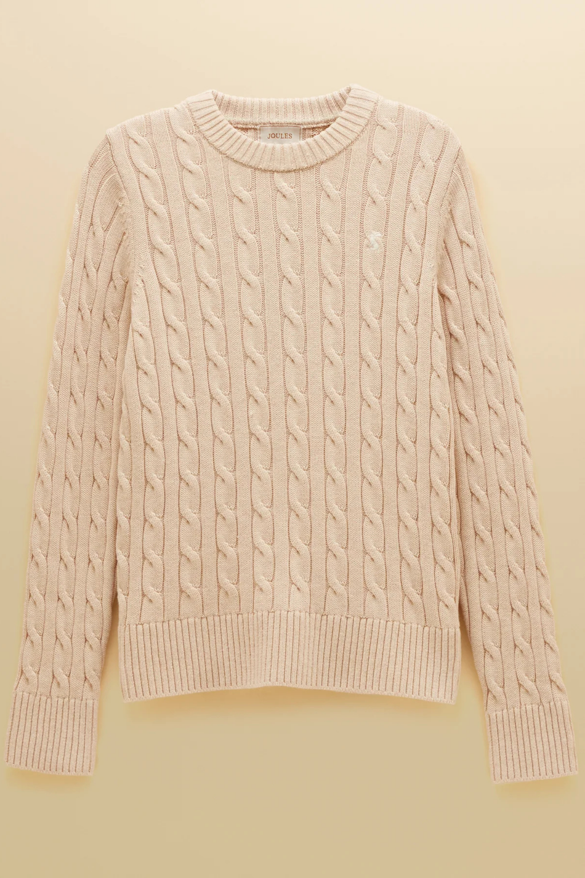 Shop the Joules Classic Cable Jumper in Oatmeal at Dotique. Made from 100% cotton with a crew neck, ribbed trims and signature hare embroidery.