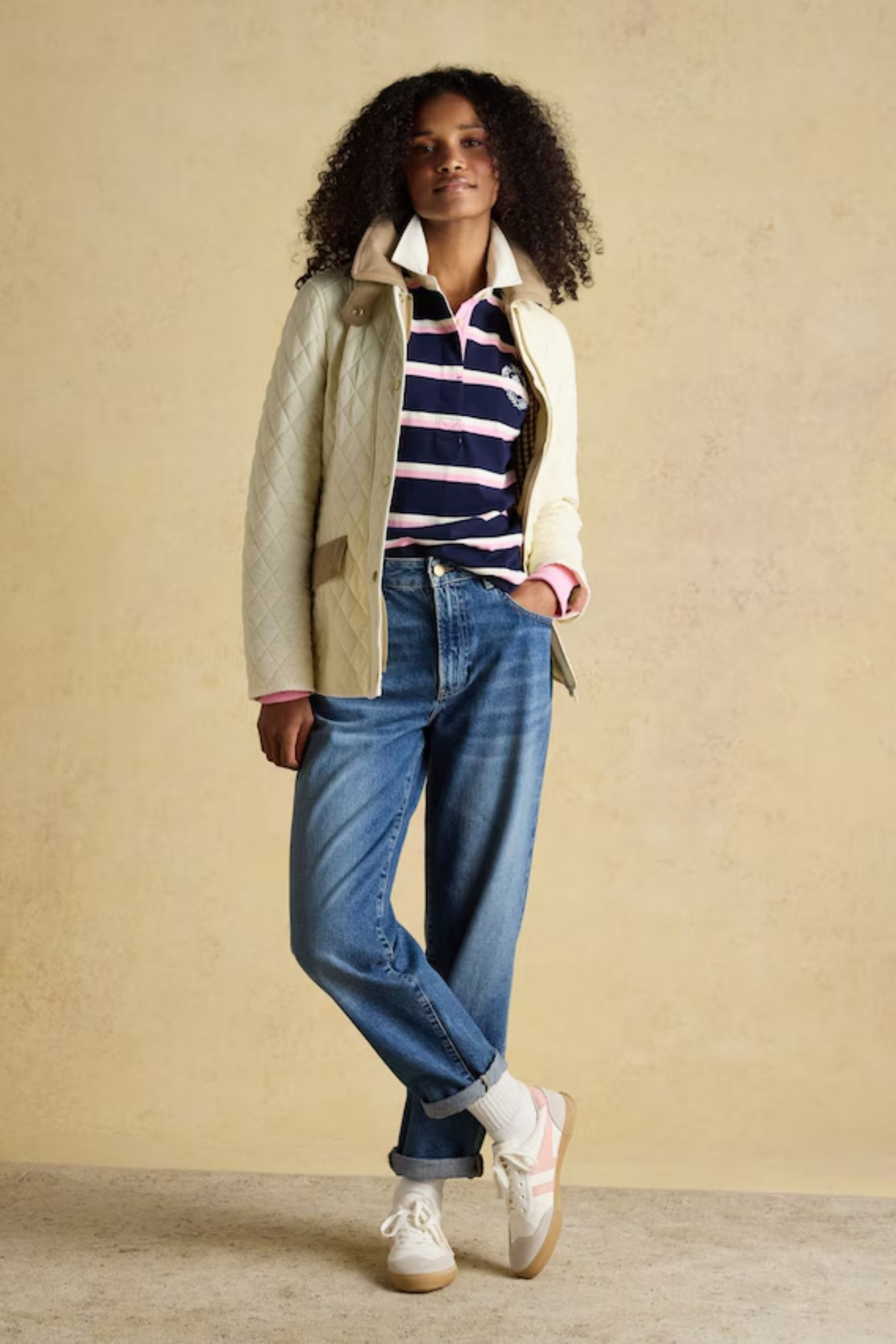 Shop the Joules Highclere showerproof diamond quilted jacket — a stylish and practical layer with cord collar, welt pockets and adjustable waist, perfect for rainy days. Shop Joules at Dotique.