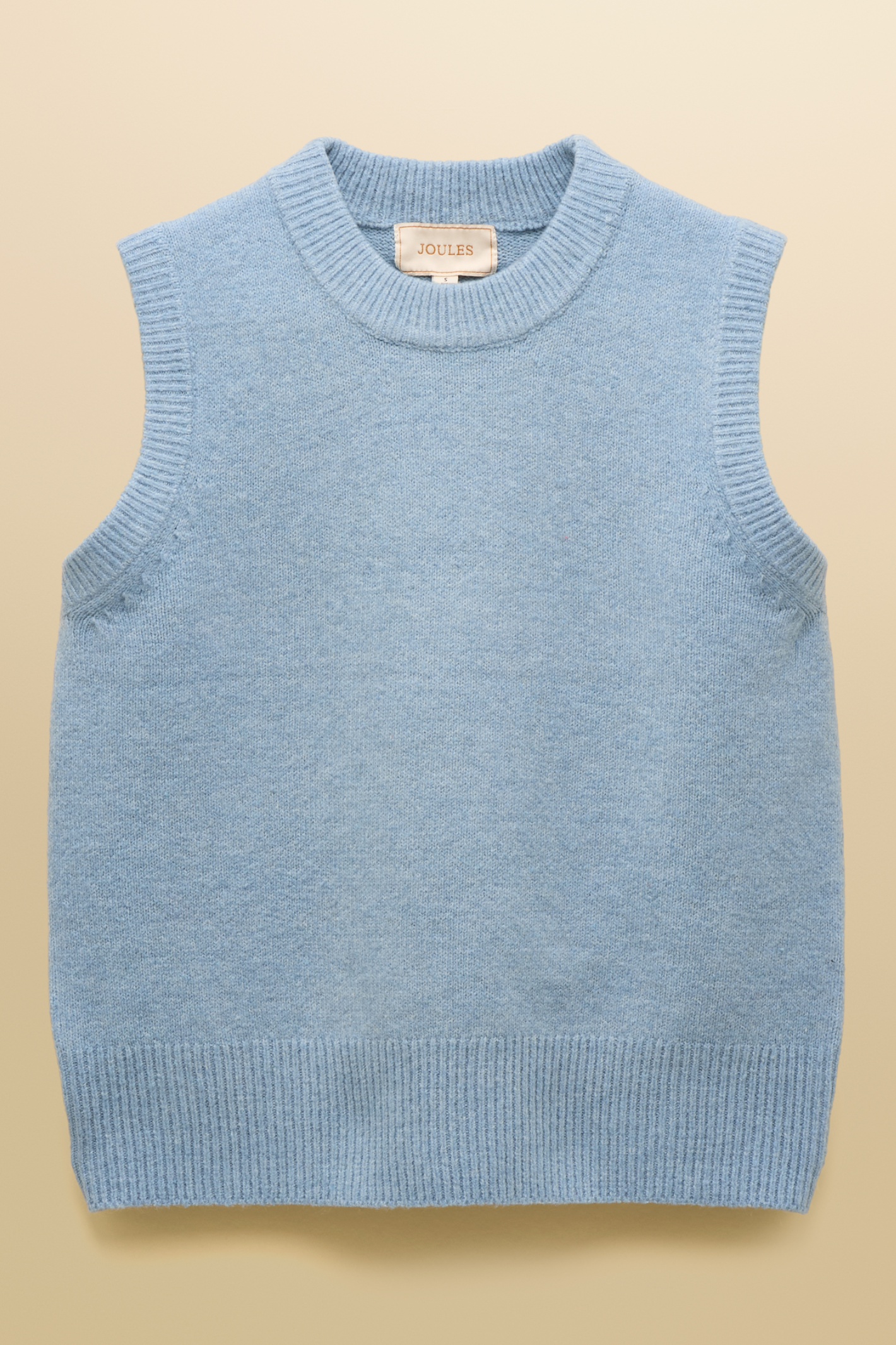 Soft knitted vest by Joules in blue. Easy to layer over shirts or dresses for everyday warmth with a timeless, wearable feel. Shop Joules at Dotique.