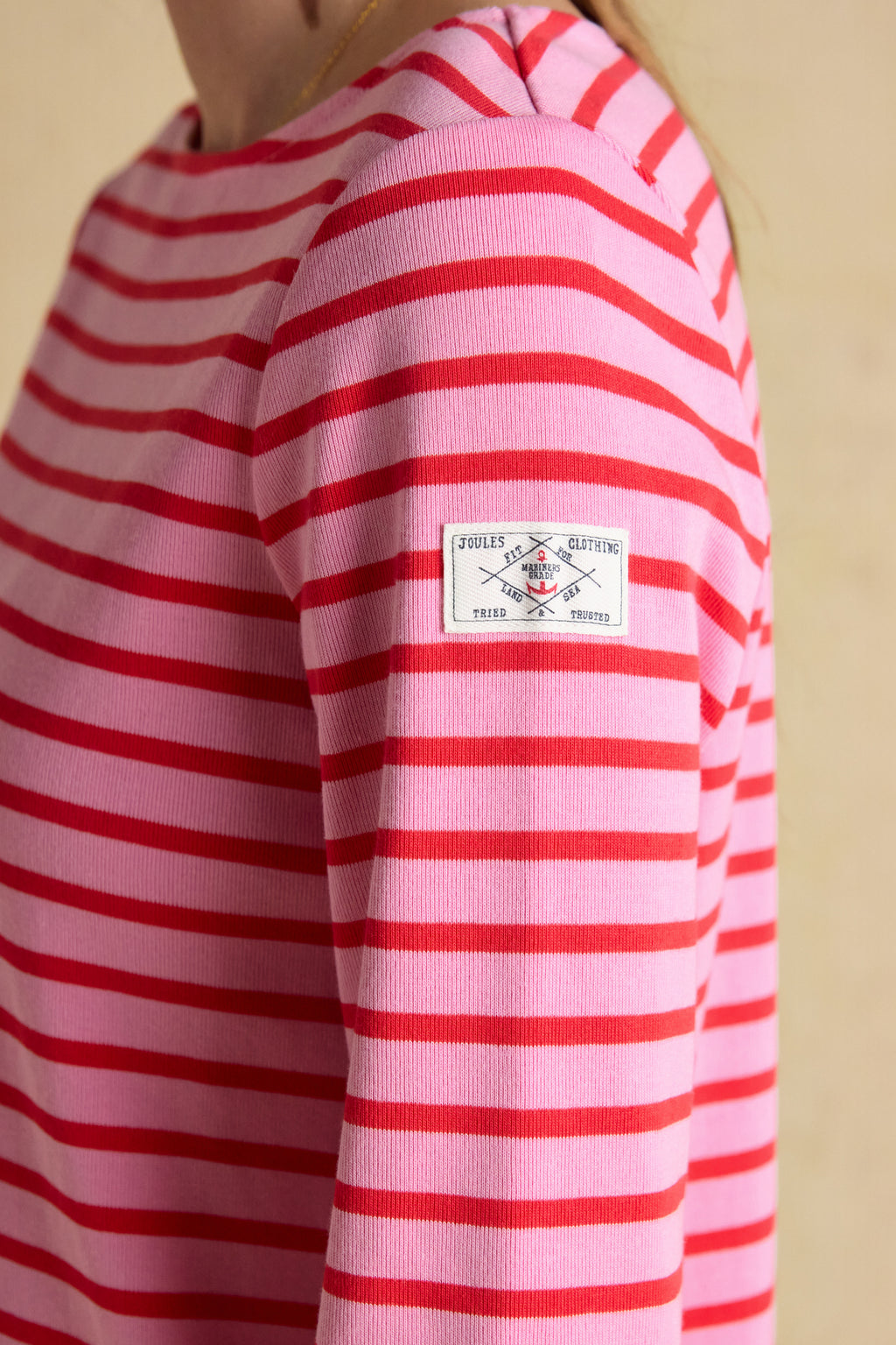 A timeless classic with a fresh pop of colour, the Joules Harbour Breton top in pink and red stripe is one of those pieces that never dates. Shop Joules at Dotique.