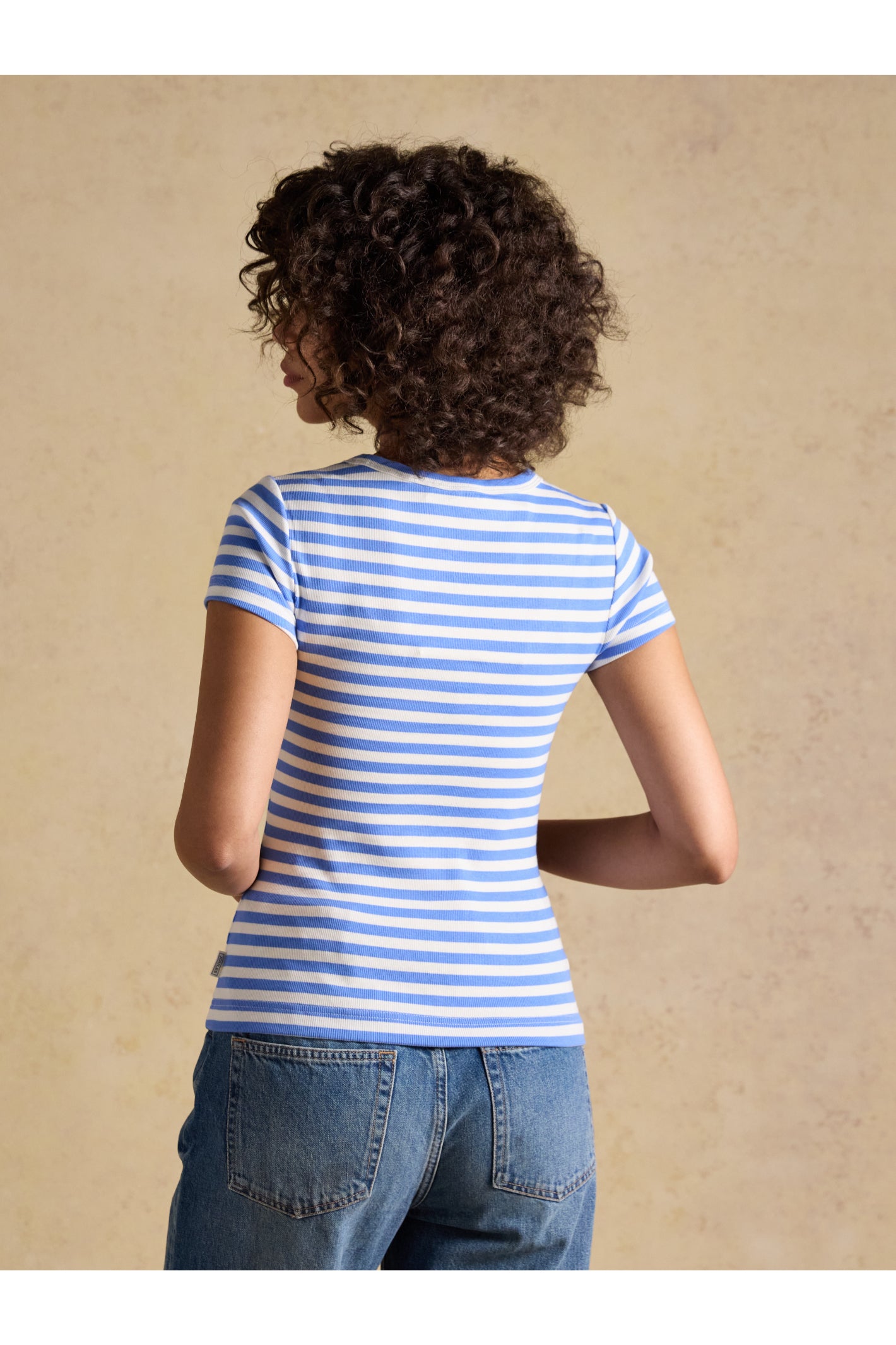 Joules H77966 Sophie Ribbed T-Shirt – Blue Stripe worn by woman, shop Joules collections at Dotique online store.