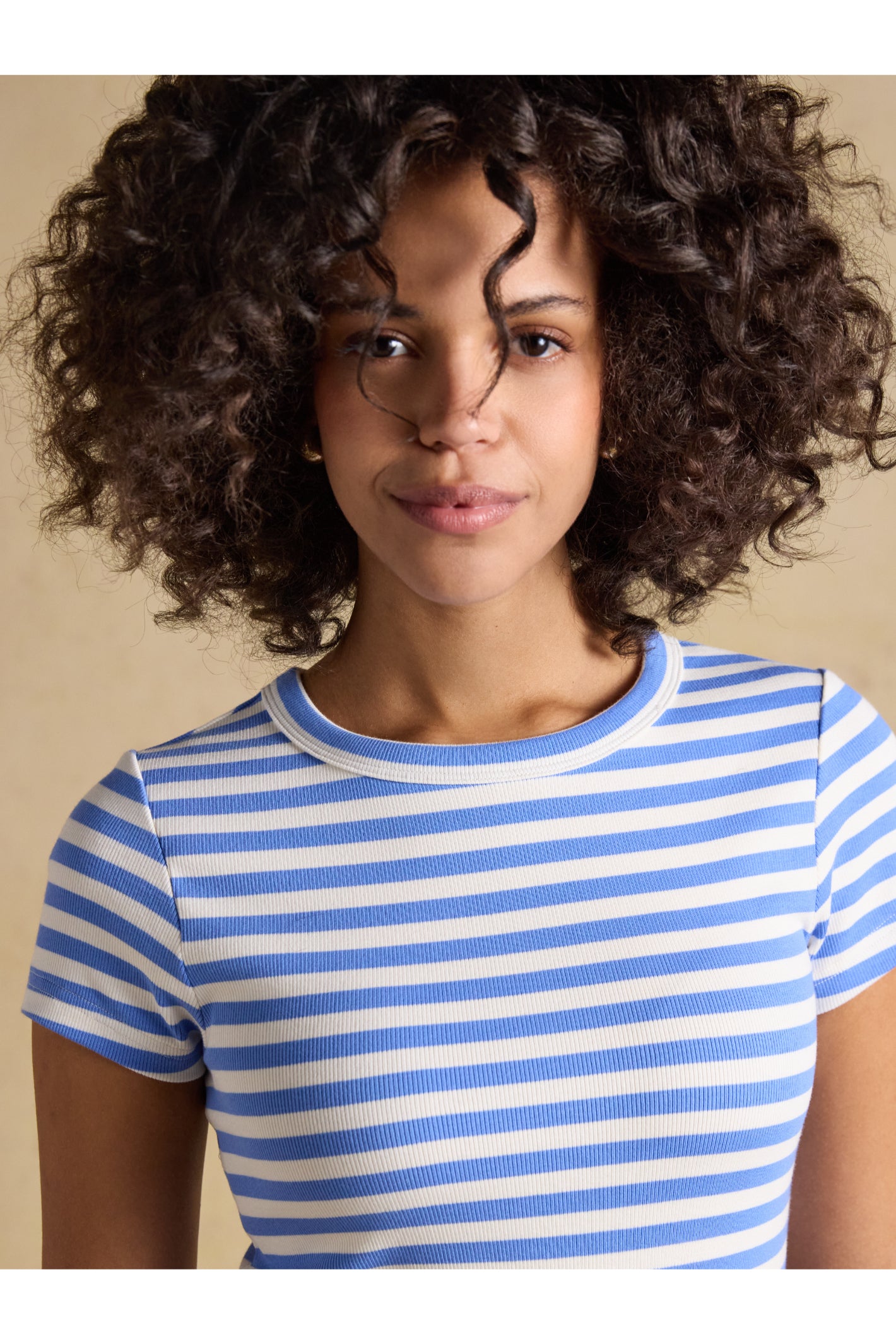 Woman wearing Joules H77966 Sophie Ribbed T-Shirt – Blue Stripe by Joules, shop the Joules collection at Dotique online.
