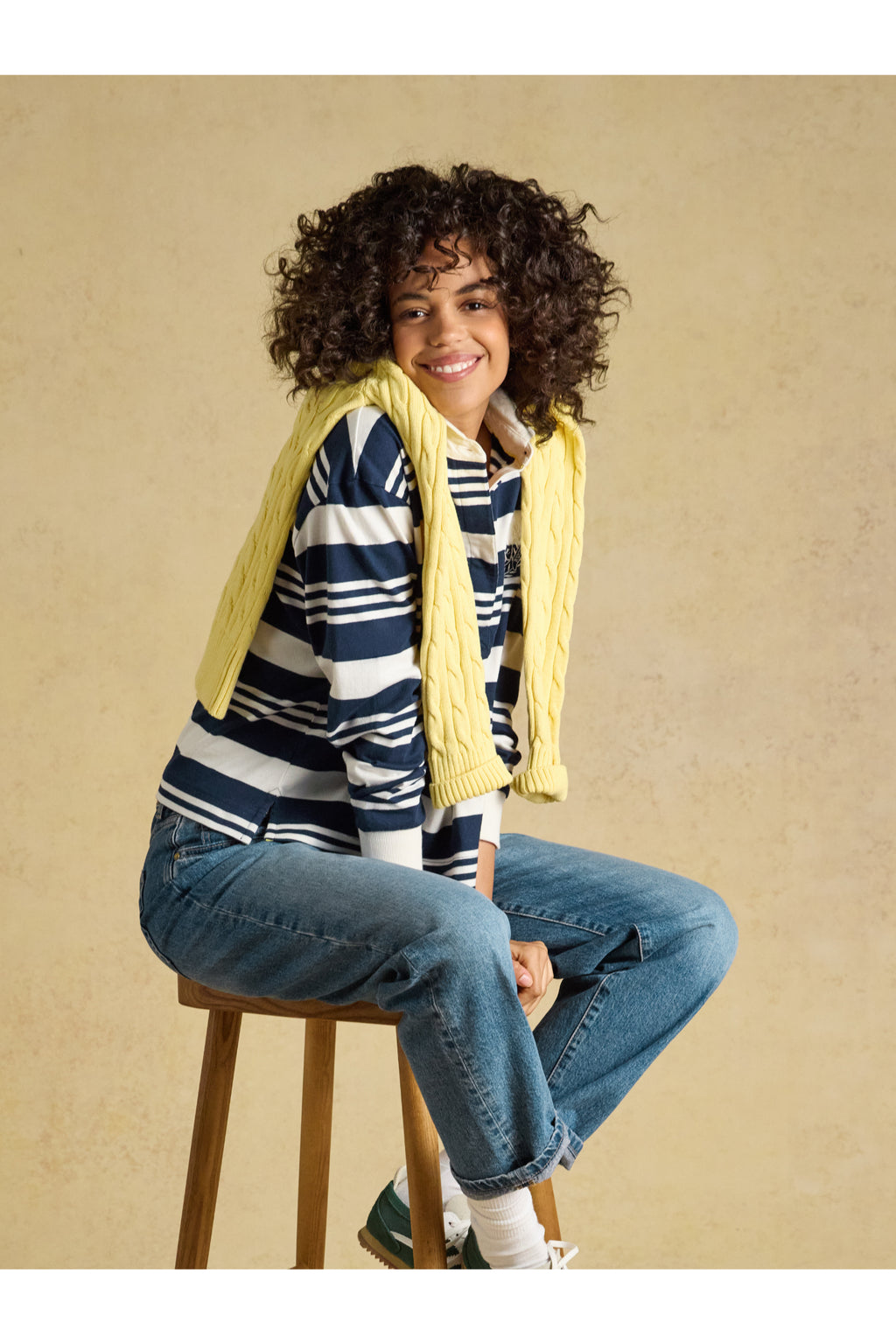 Joules Lara Navy/White Stripe Top worn with a yellow scarf. Joules. Shop Joules at Dotique
