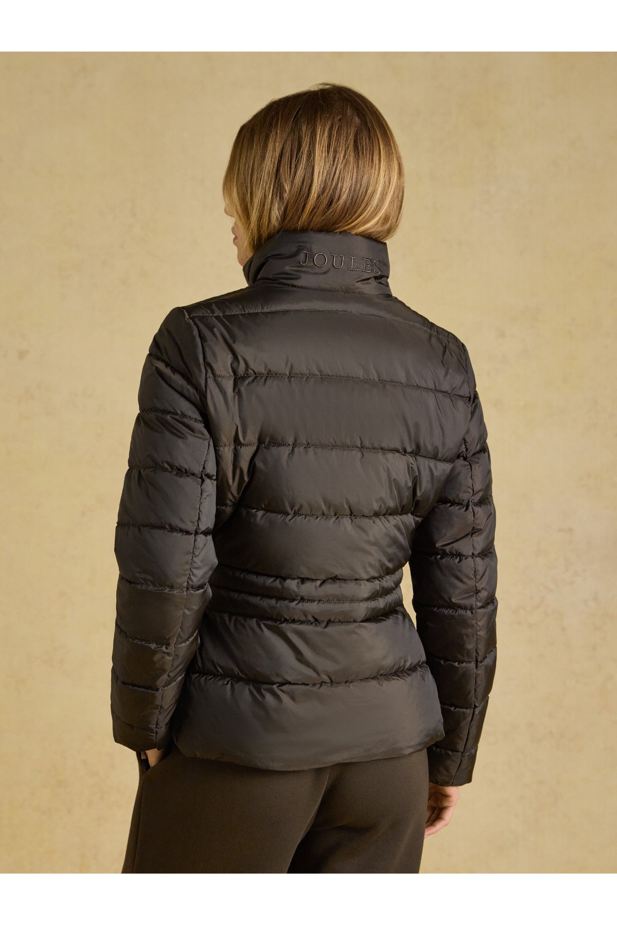 Joules Paddock Brown Coat worn from behind by a model. Joules. Shop Joules at Dotique