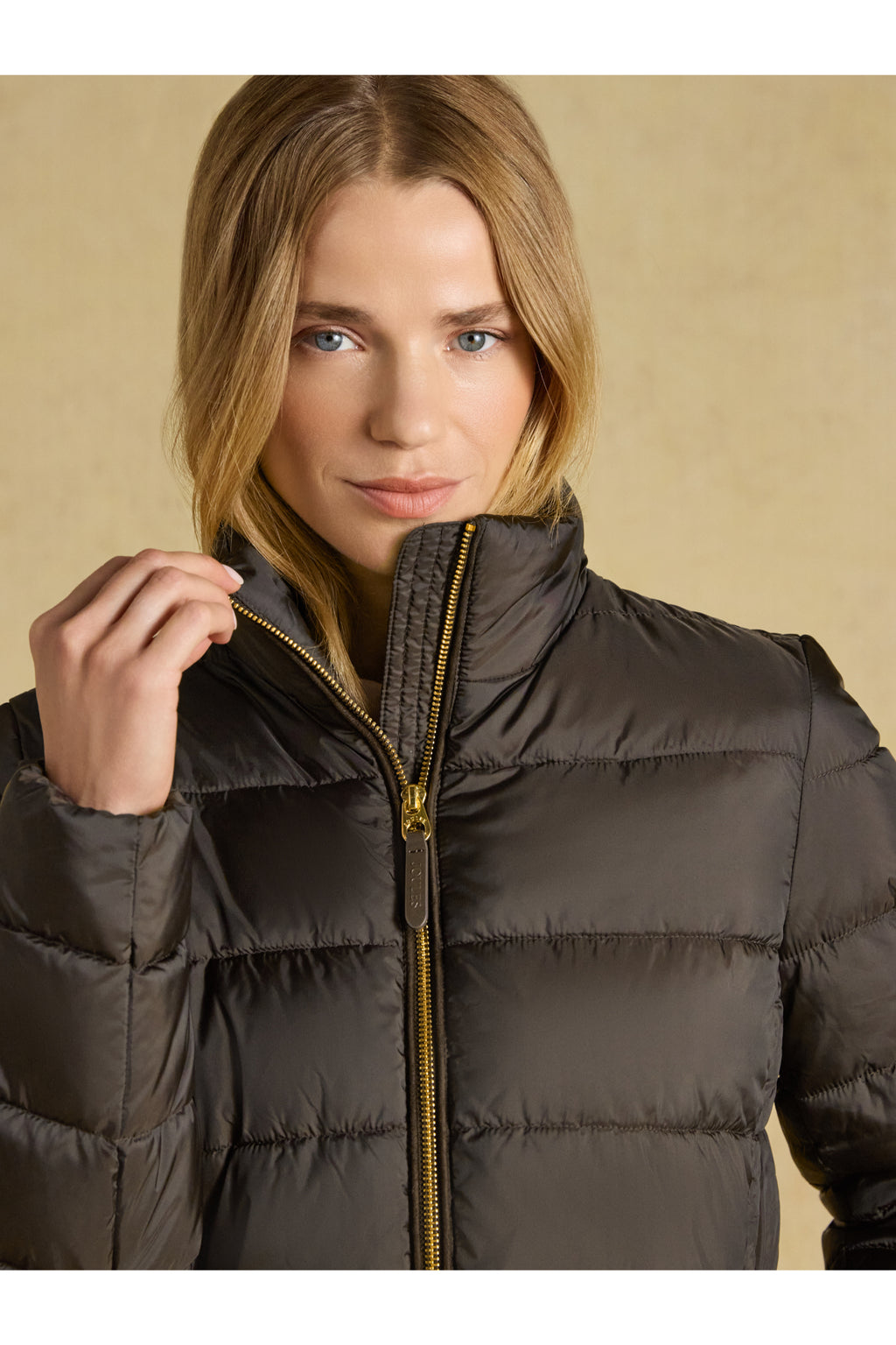 Model wearing Joules Paddock Brown Coat by Joules. Shop Joules at Dotique