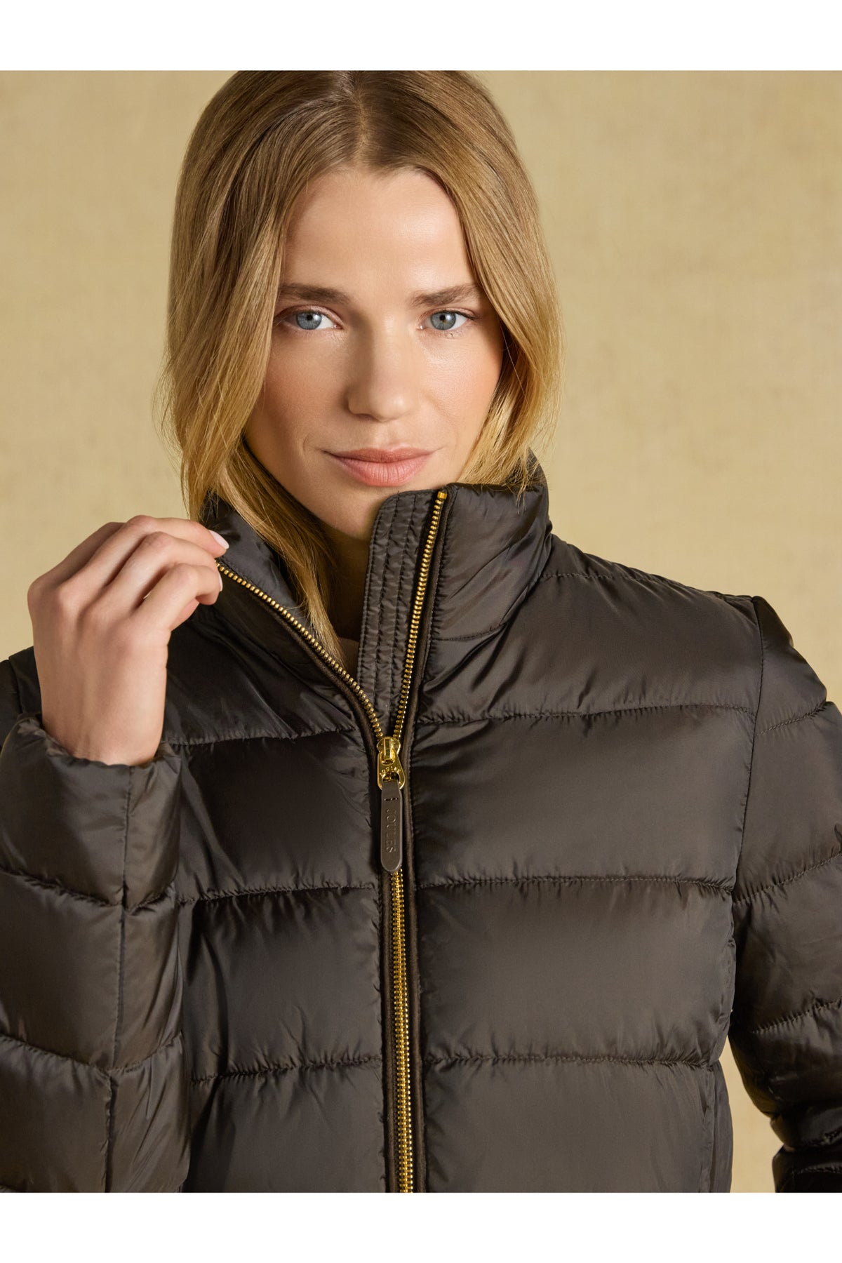 Model wearing Joules Paddock Brown Coat by Joules. Shop Joules at Dotique