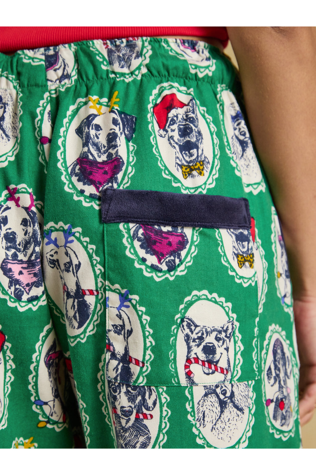 Joules Stella Green Dog Print Pyjamas close up of dog print bottoms. Shop Joules at Dotique