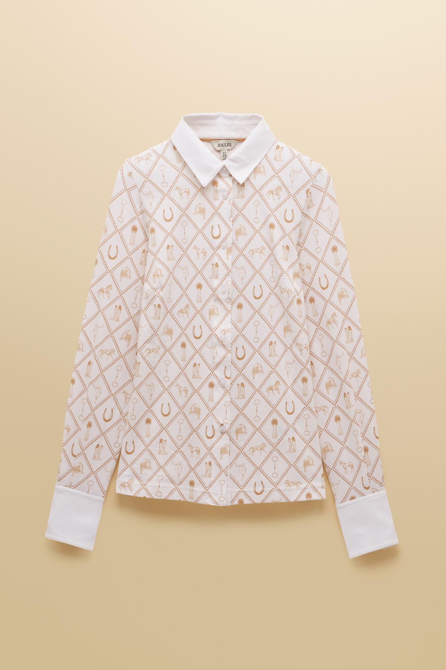 Designed with a classic collar, button-through front and long sleeves with cuffs, it sits neatly without feeling restrictive. Shop Joules at Dotique.