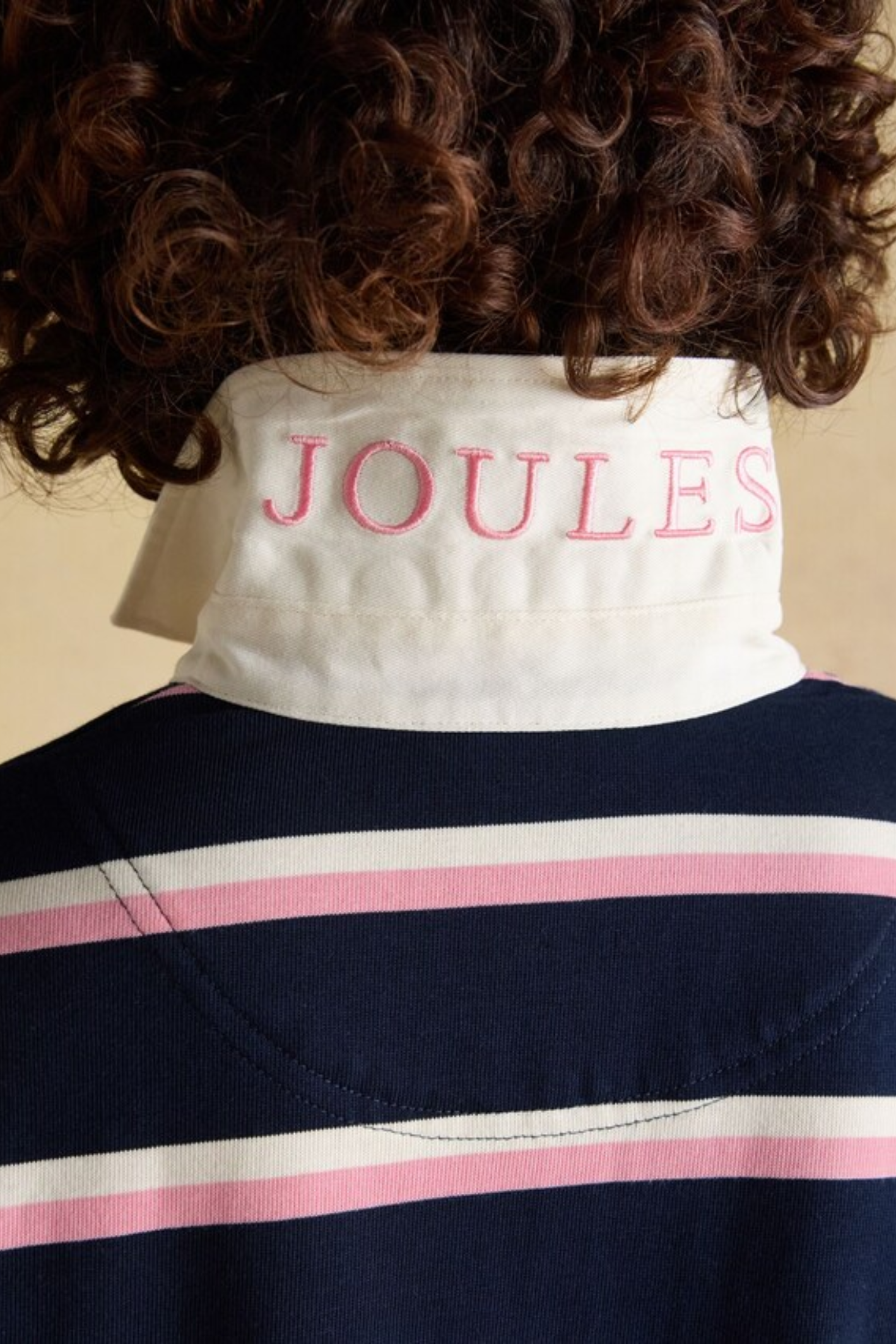 Close-up of Joules W30854 Lara Rugby Shirt – Navy / Pink Stripe collar with Joules logo embroidered, shop Joules at Dotique