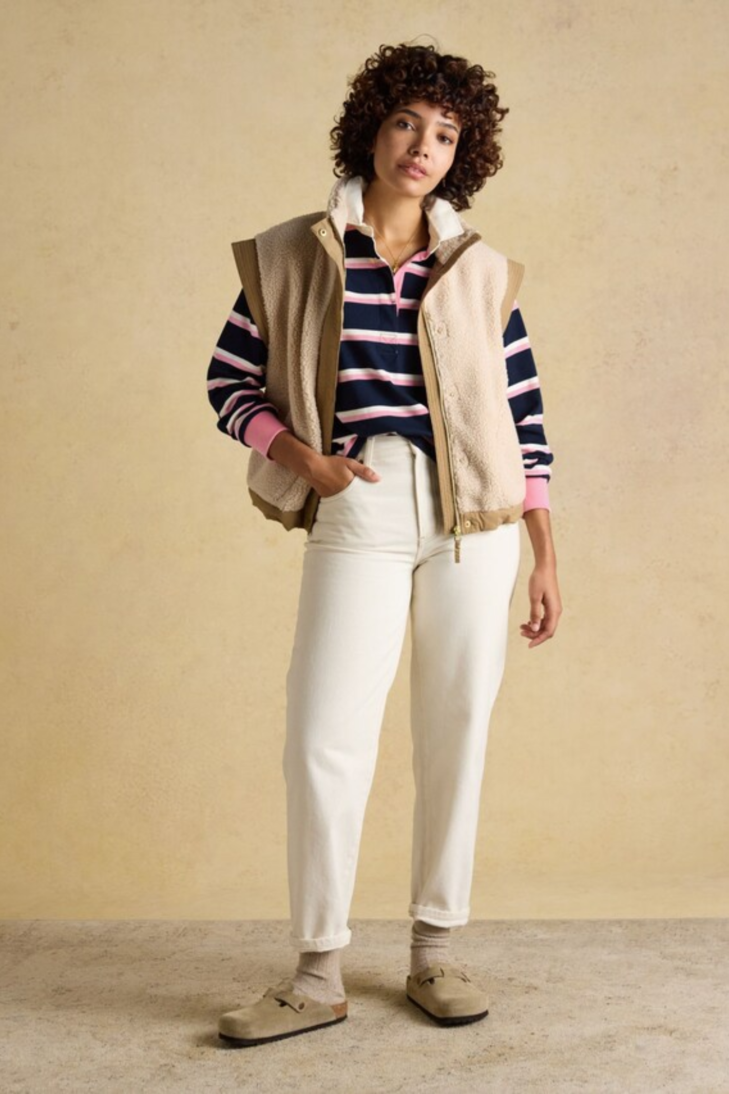 Model wearing Joules W30854 Lara Rugby Shirt – Navy / Pink Stripe by Joules, shop Joules at Dotique.