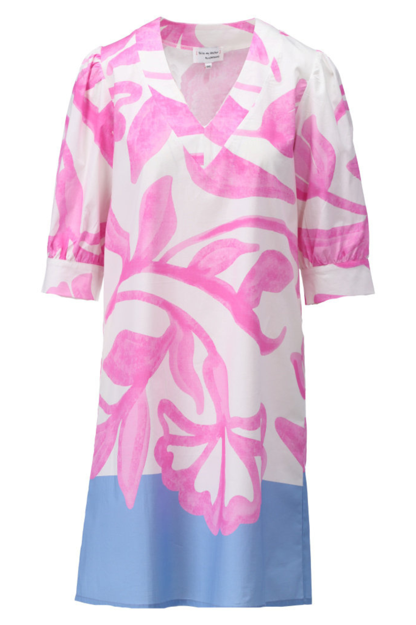 White midi dress with bold pink abstract leaf print, V-neck, puffed three-quarter sleeves, and solid blue hem panel
