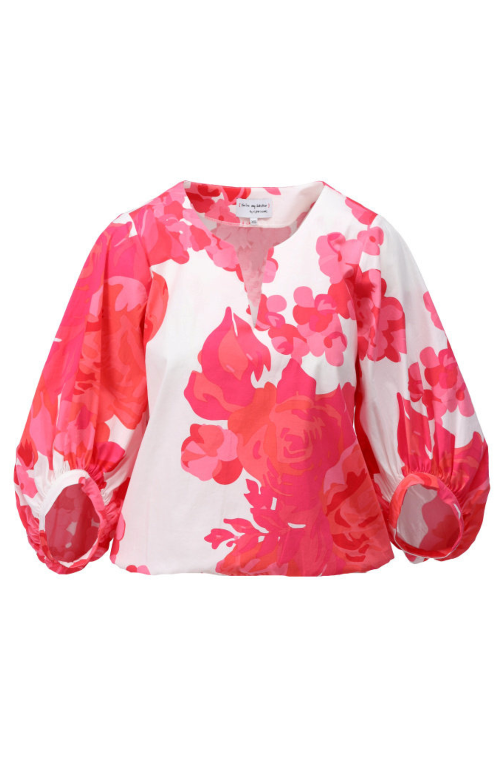 Floral patterned blouse with pink and white colors on a white background
