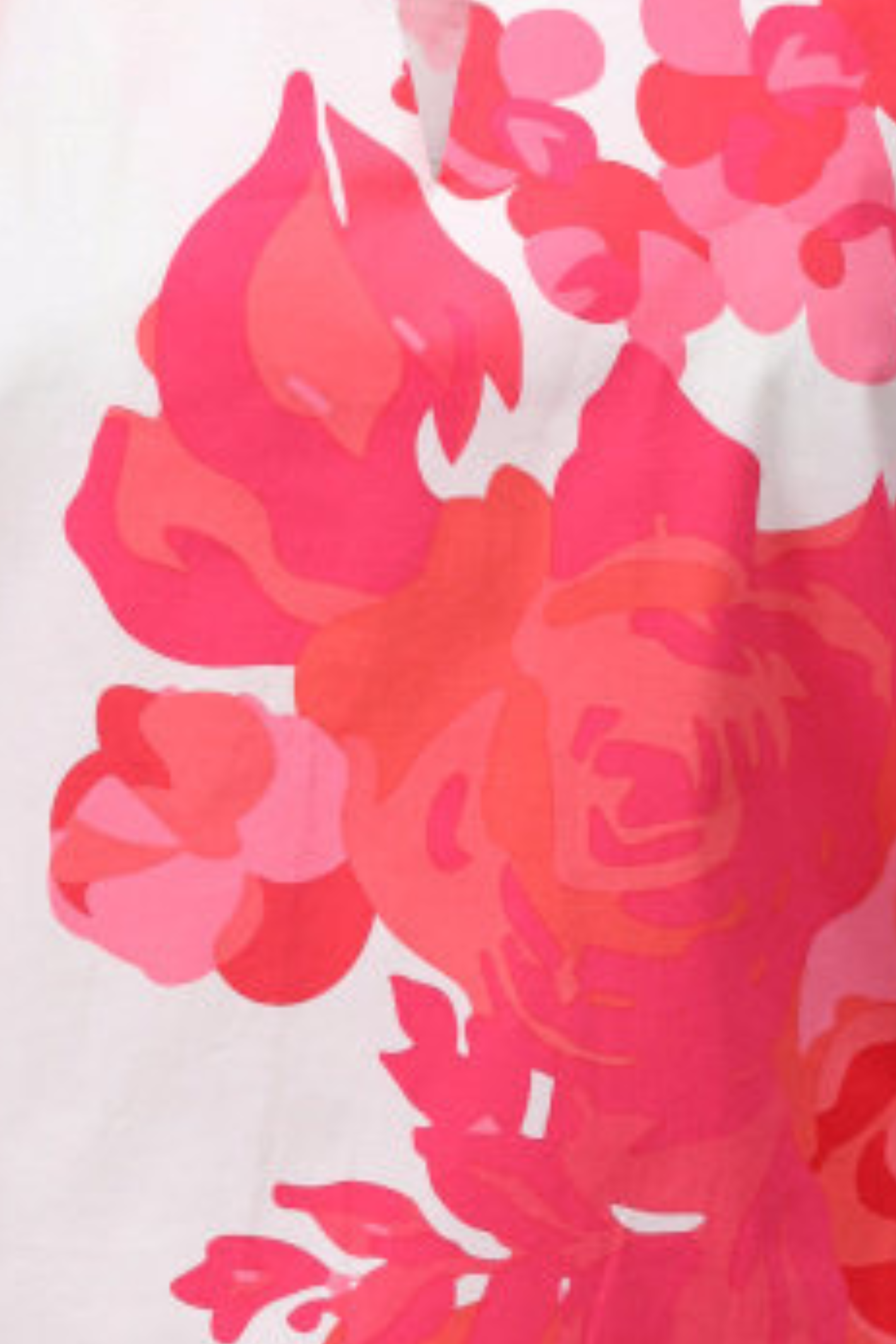 Close-up of a vibrant pink floral pattern on a white background